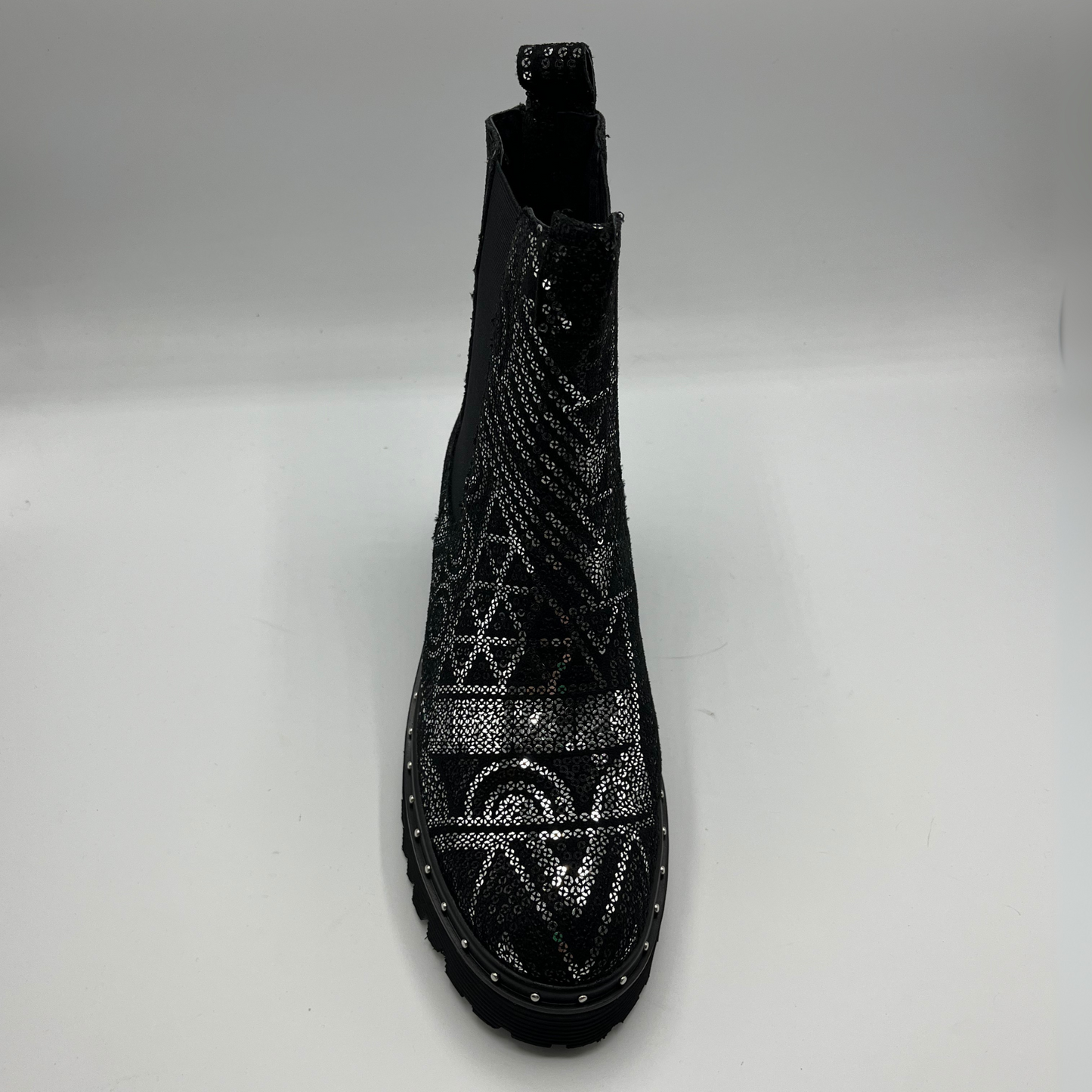 Black sequin boot on a white background