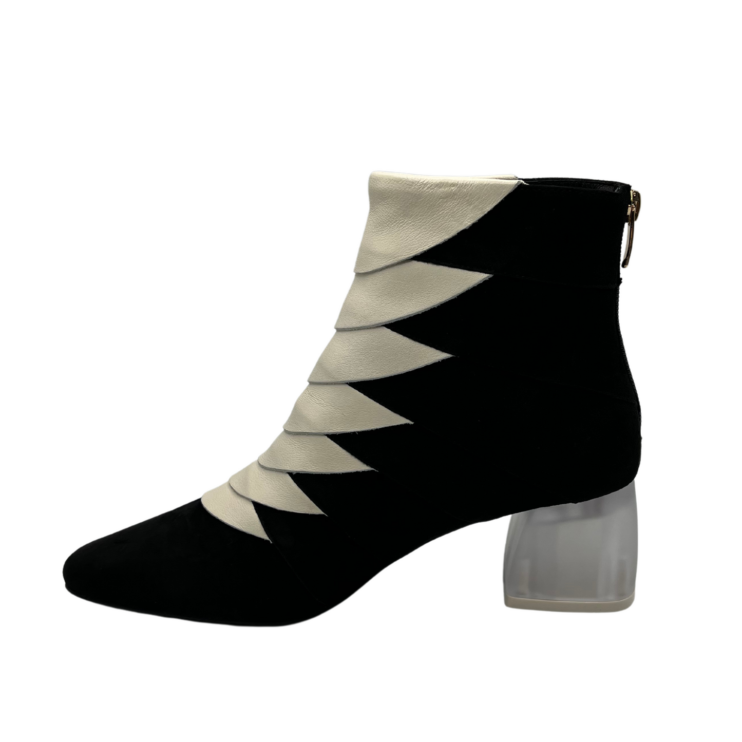 Left facing view of black and ivory short boot with translucent block heel, soft pointed toe and back zipper closure