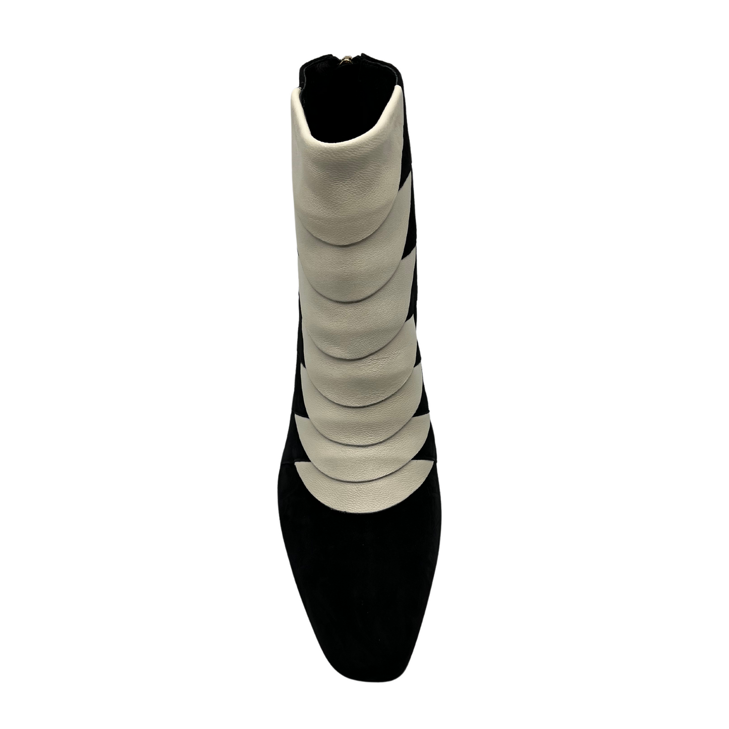 Top view of black and ivory short boot with translucent block heel, soft pointed toe and back zipper closure