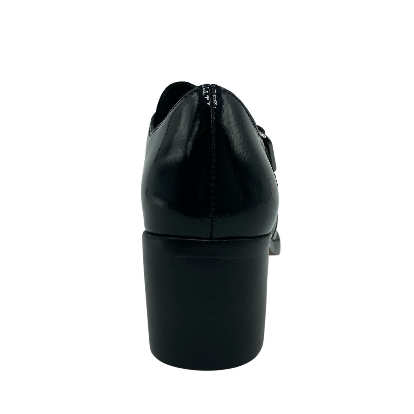 Hind view of black patent leather loafer with block heel