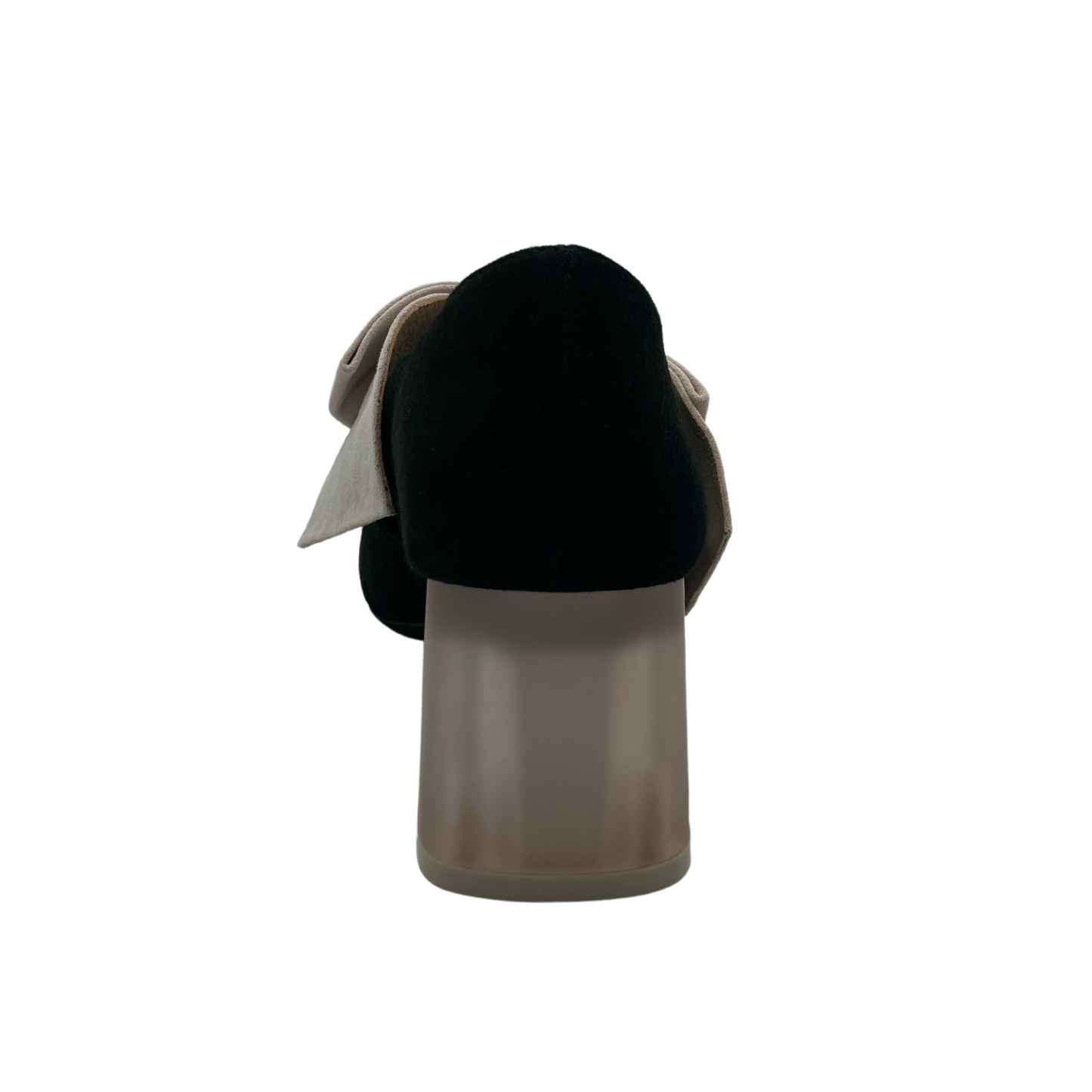 View of the heel of a black mary jane shoe with lucite heel