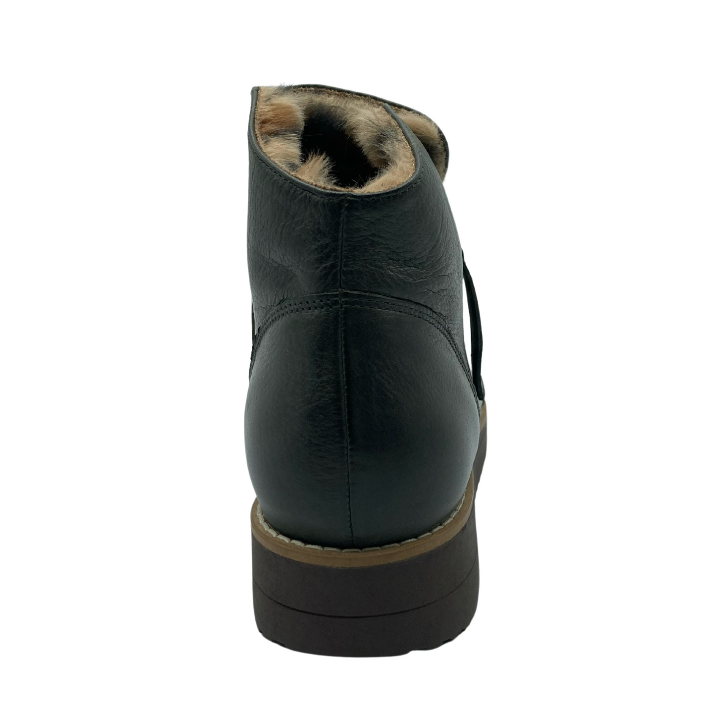 Heel view of back of leather ankle boot with faux fur lining
