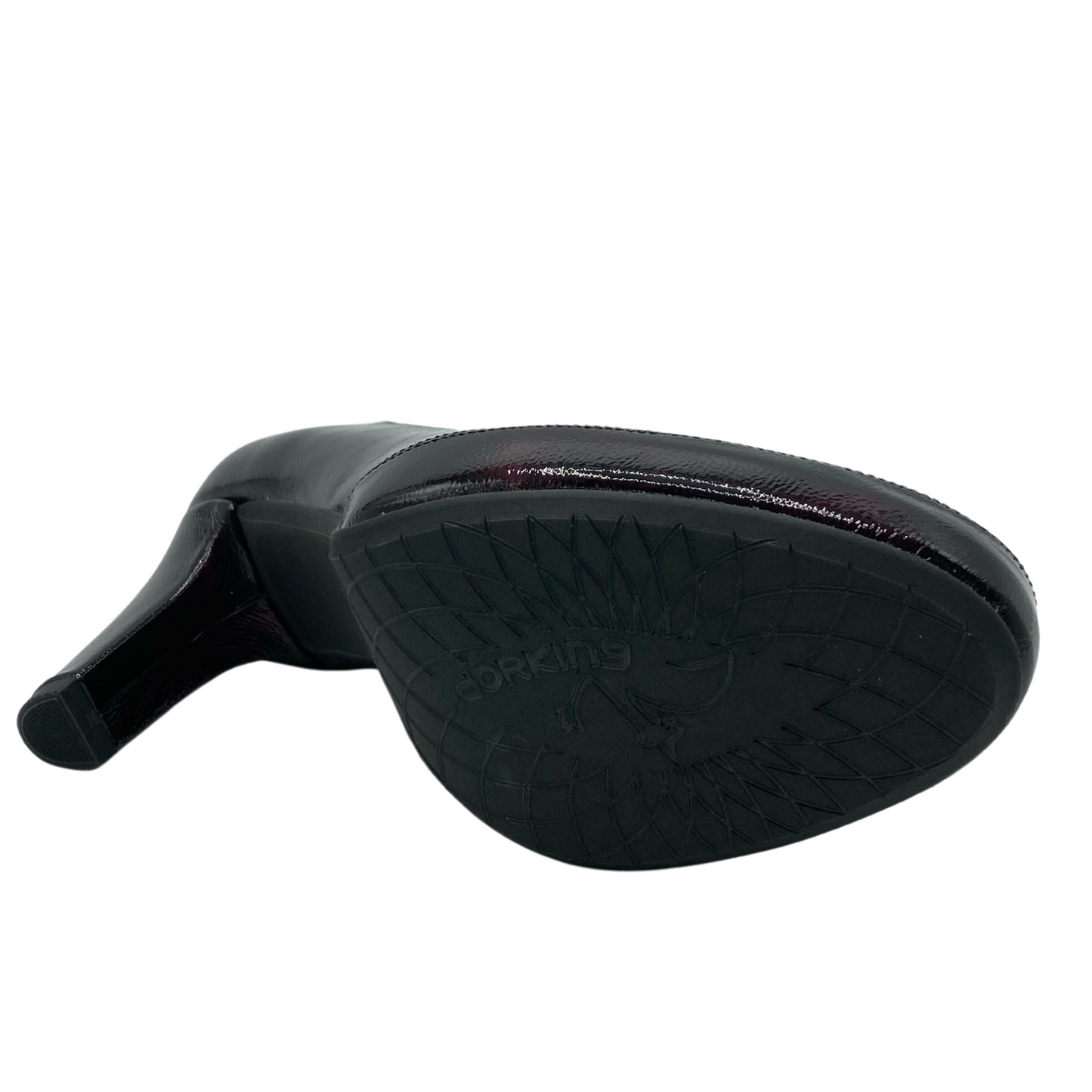 Bottom view of patent leather pump with black outsole