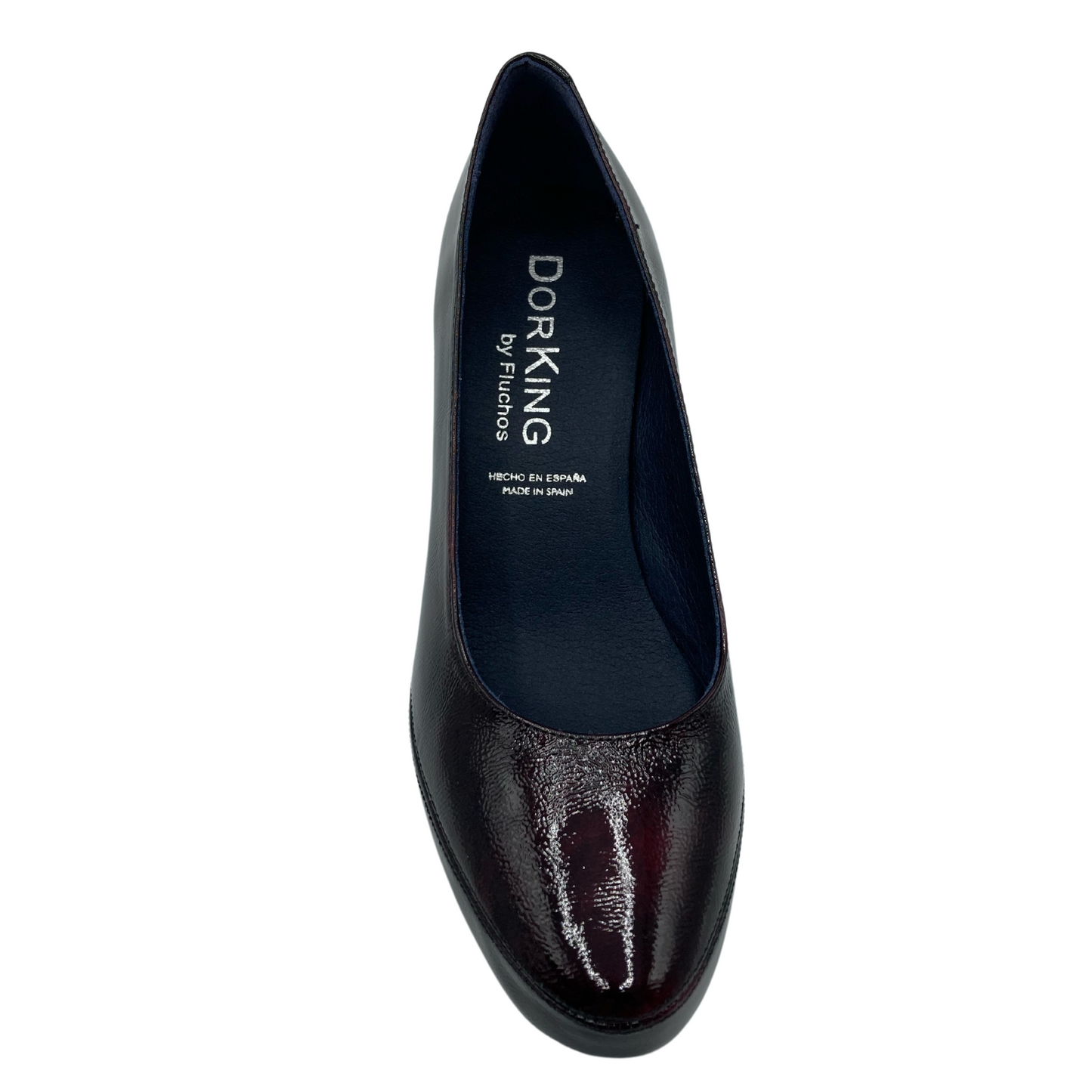Top view of a patent leather pump with rounded toe