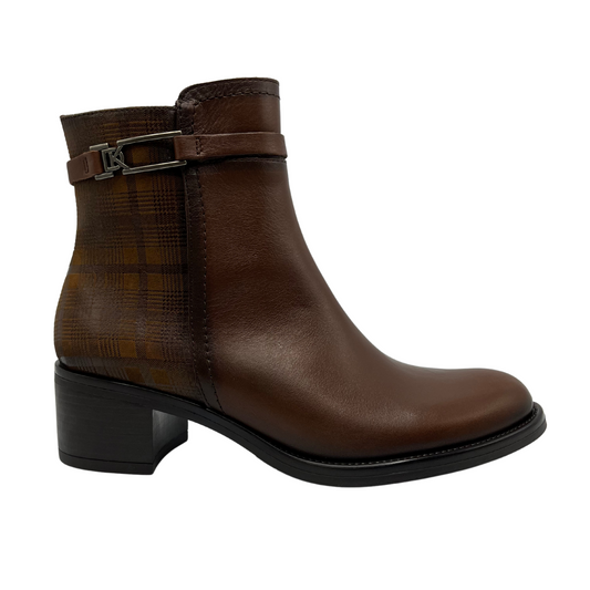 Right facing view of brown leather short boot with decorative ankle strap, short block heel and printed pattern on the ankle