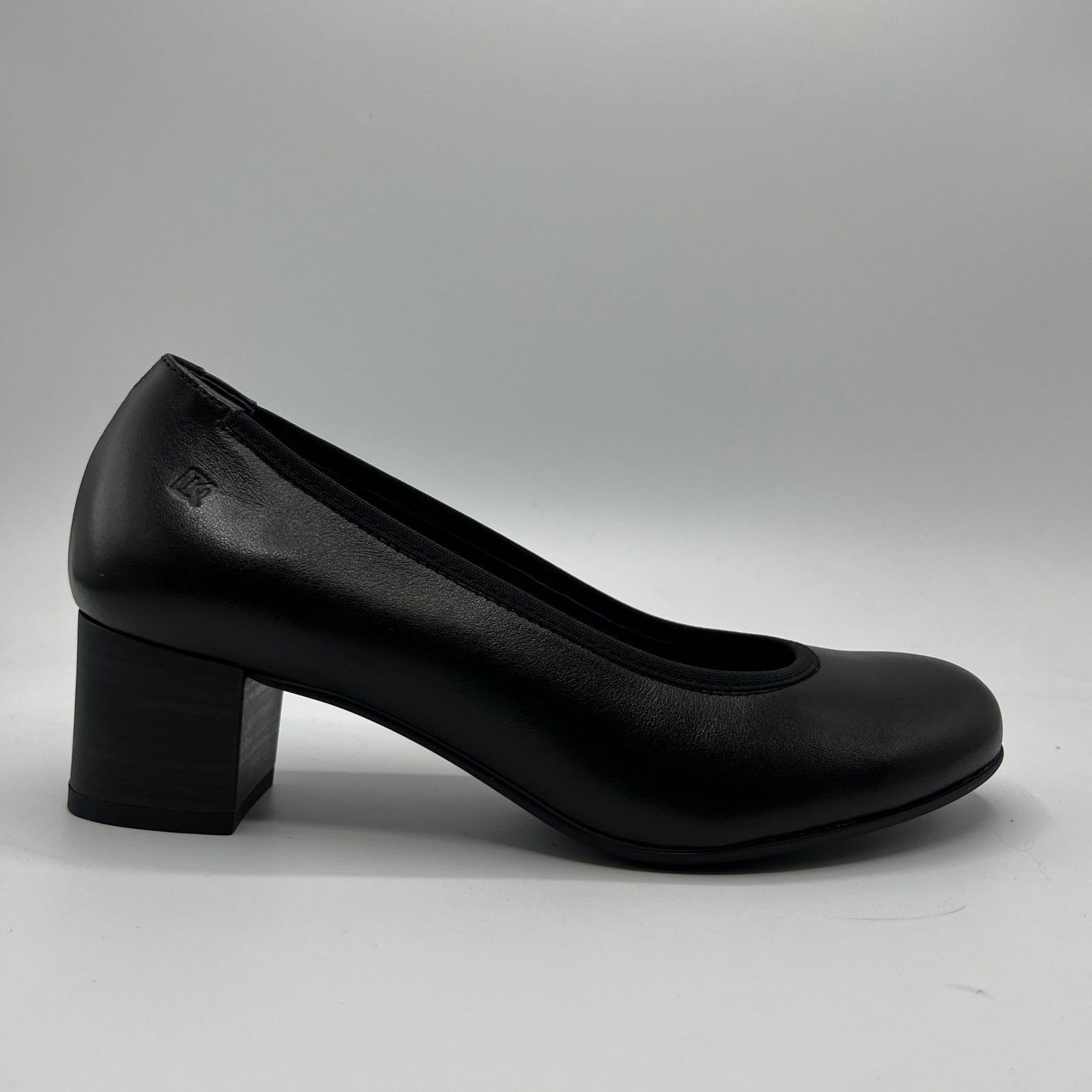 Black shoe on a gray background