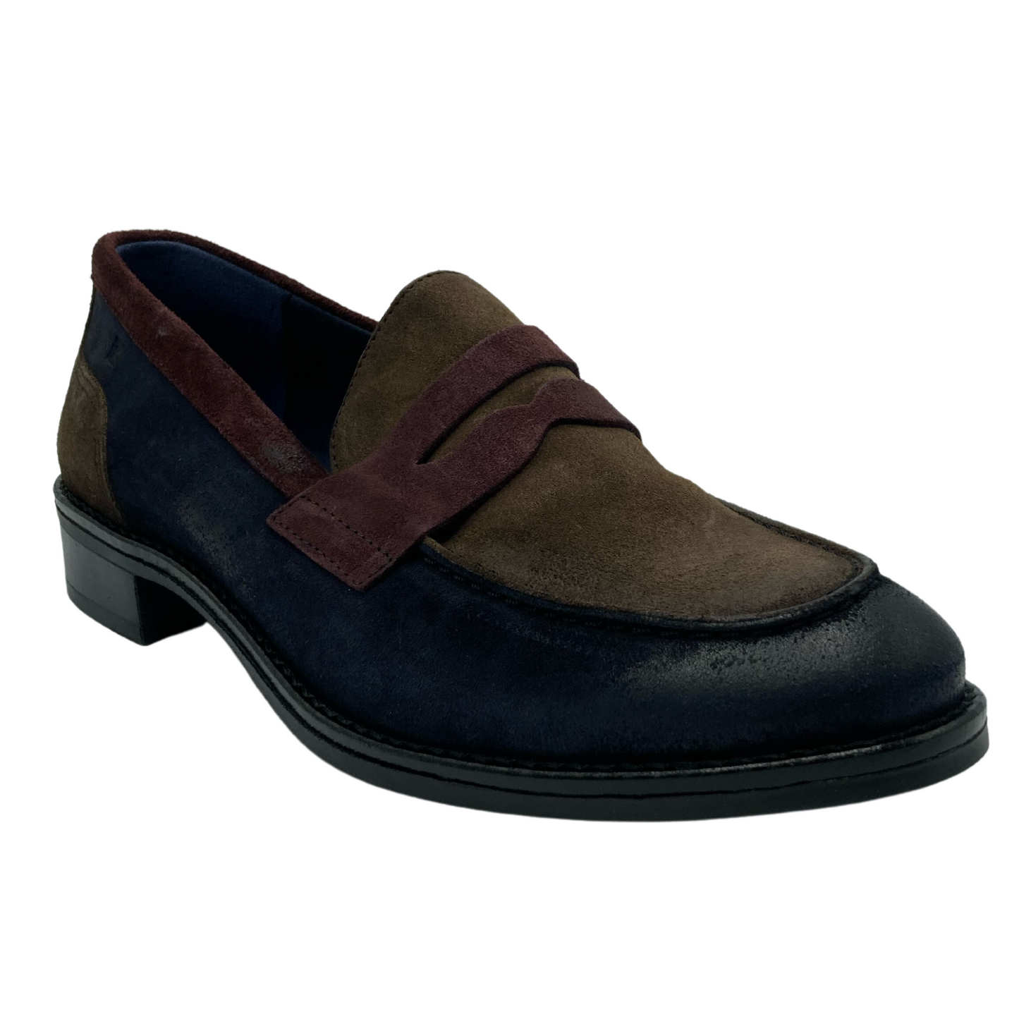 45 degree angled view of blue, brown and red suede loafer with black outsole and short heel