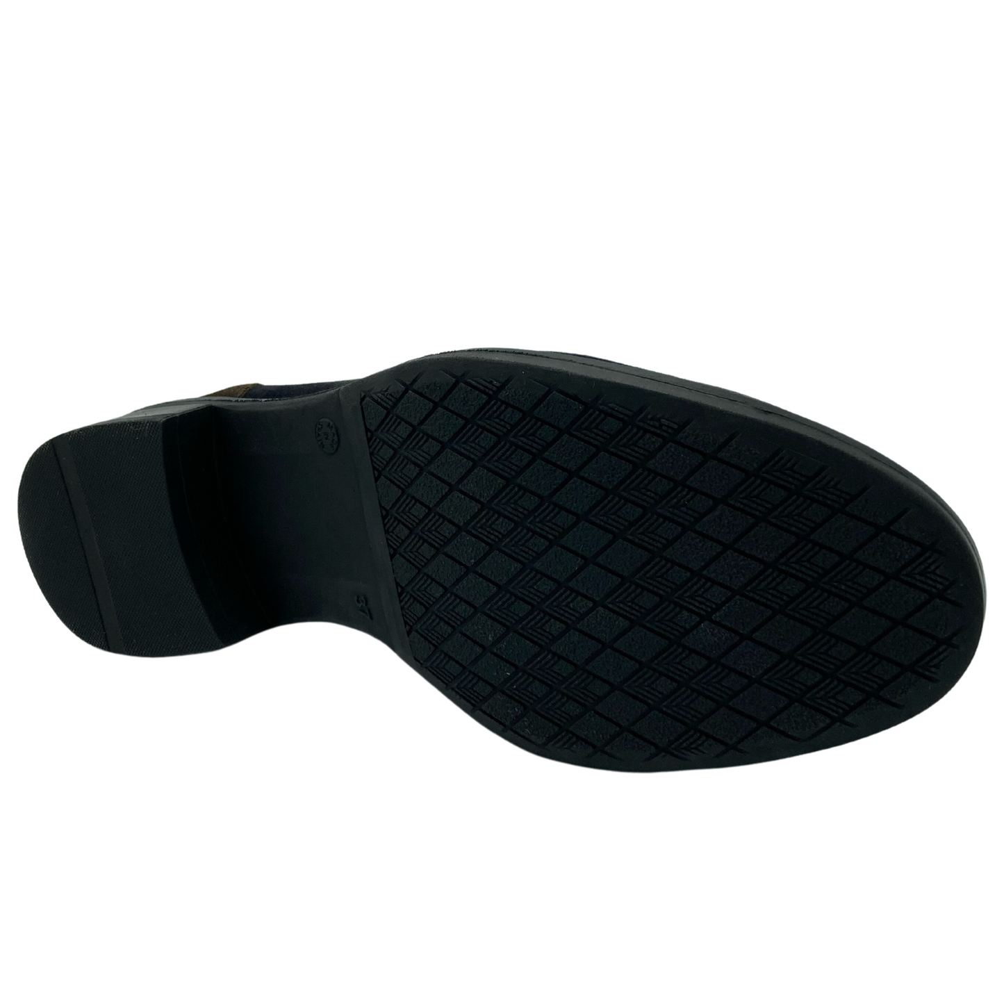 Bottom view of suede loafer with black heel and sole