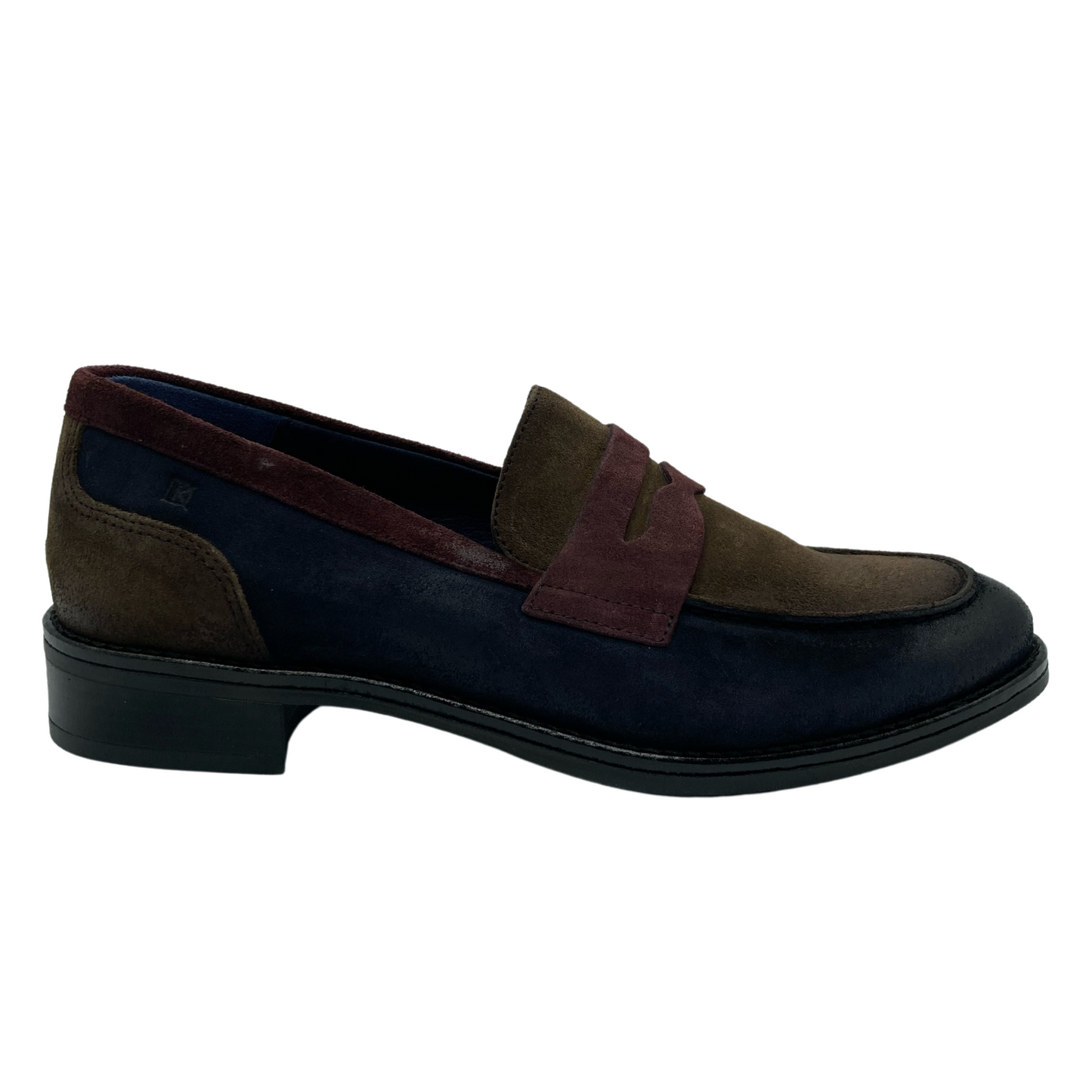 Right facing view of blue, red and brown loafer with black outsole and heel