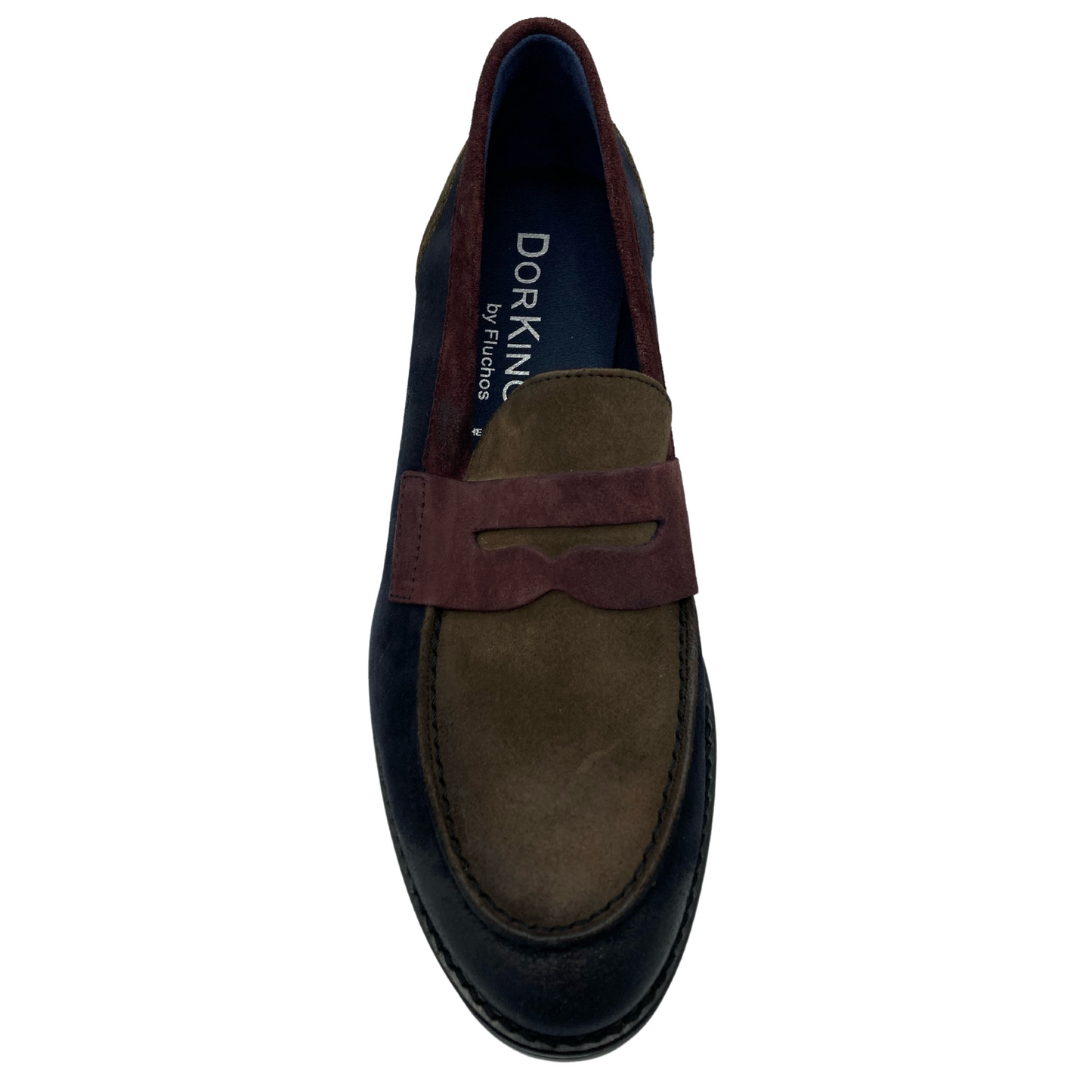 Top view of blue, red and brown suede loafer with black sole