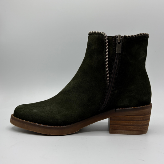 A dark olive blue suede ankle boot with a block heel shown against a light gray background.