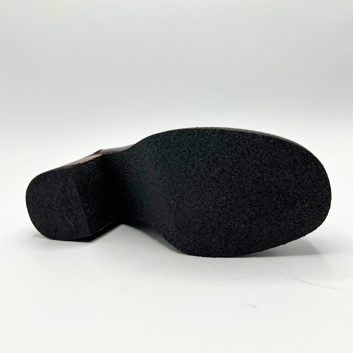 Black shoe sole on a white background