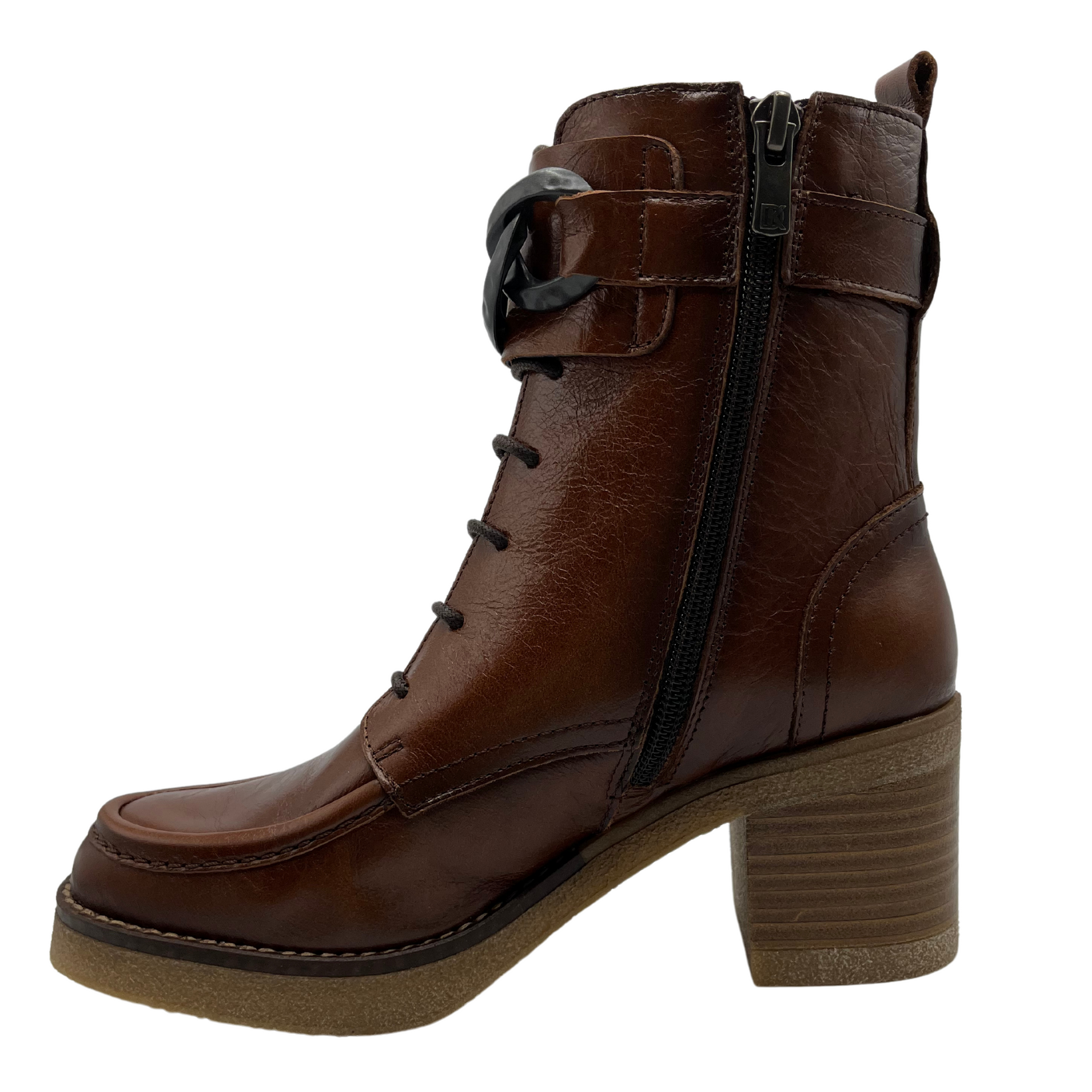 Left facing view of brown leather short boots with a chunky block heel, rounded toe and both lace up front with side zipper closure