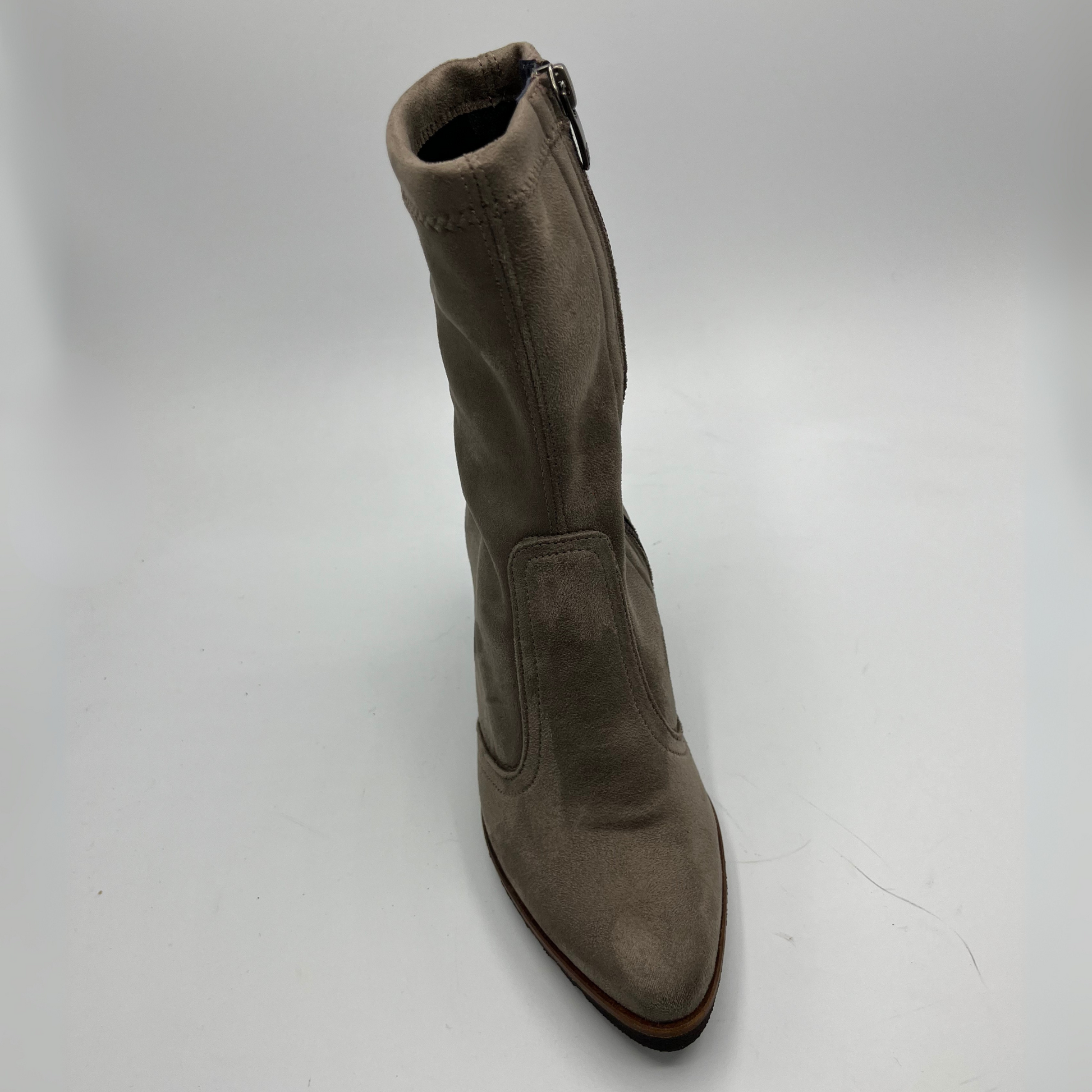 Taupe coloured boot on a white background