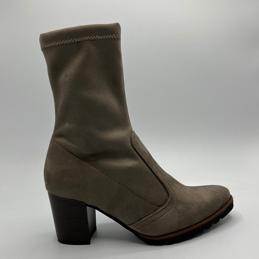 Taupe ankle boot with a block heel on a light gray background