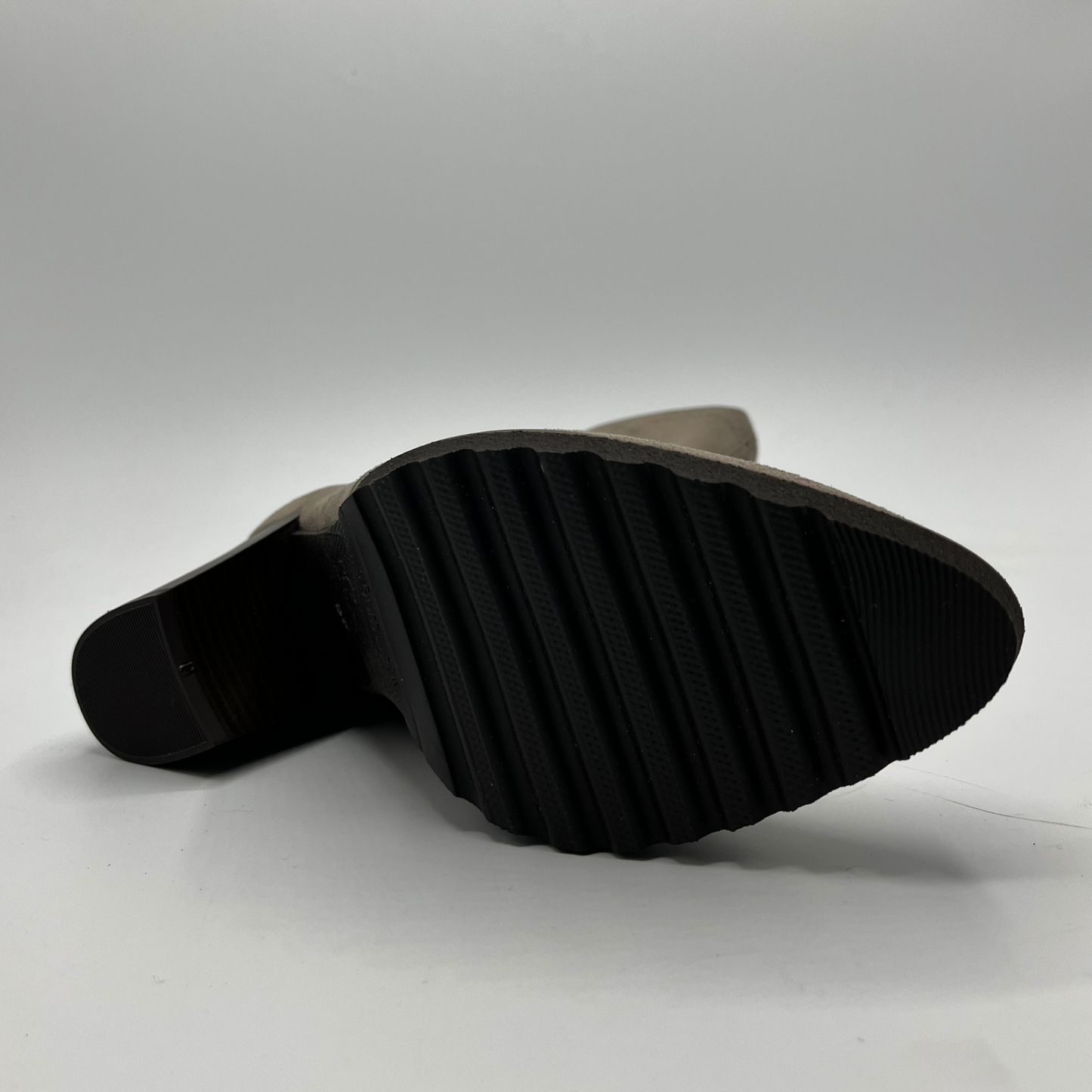 Black rubber boot sole on a white background