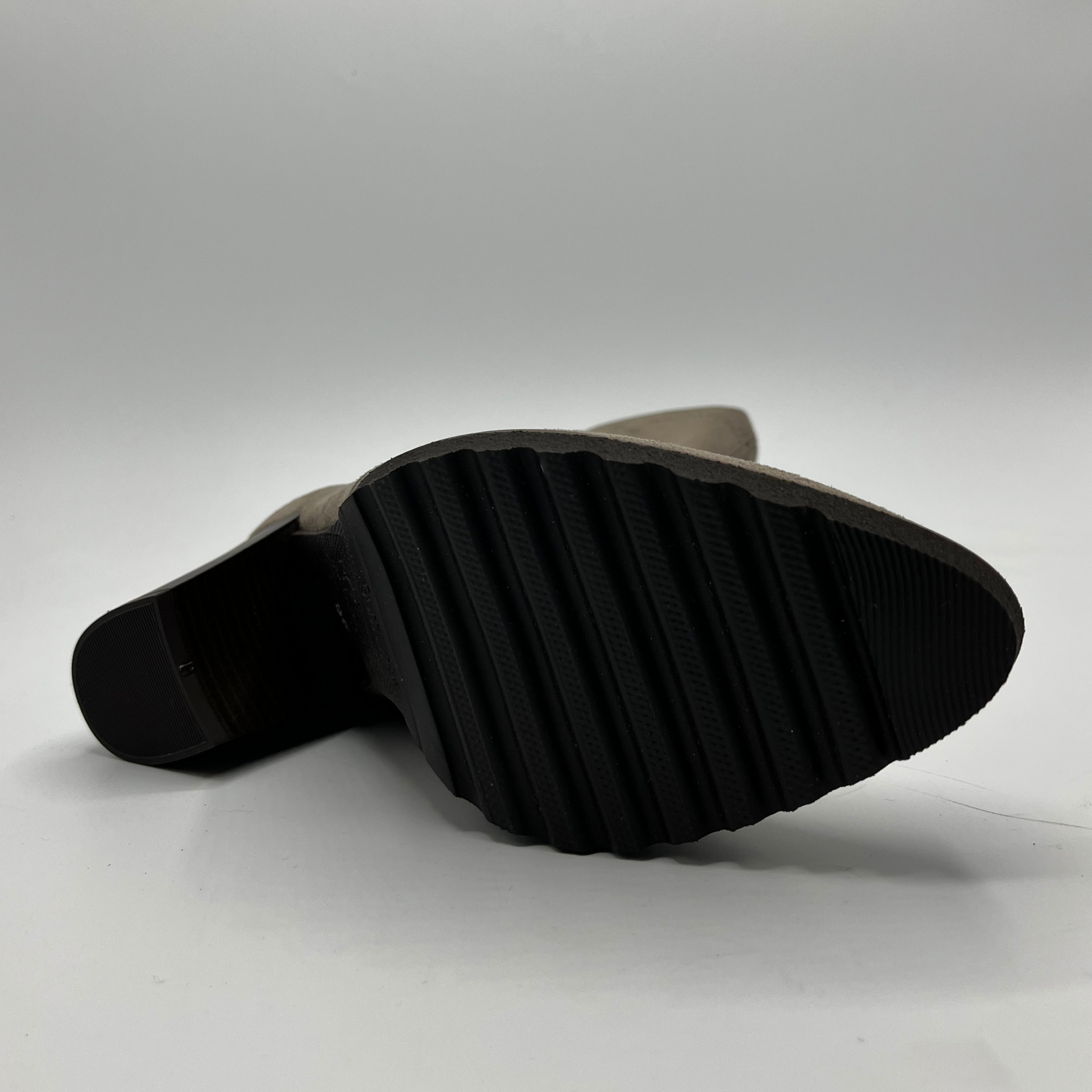 Black rubber boot sole on a white background