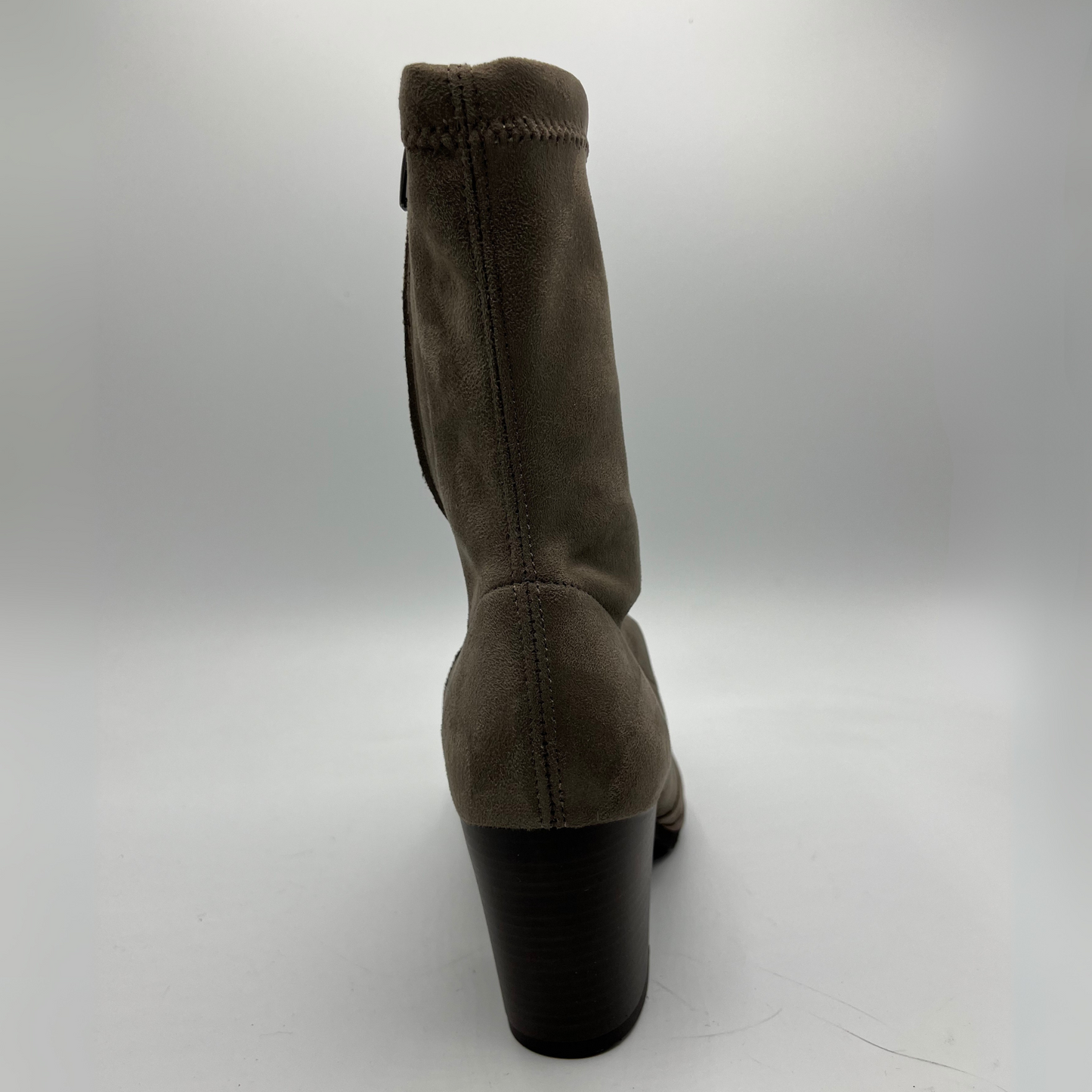 Taupe boot with a black heel on a white background