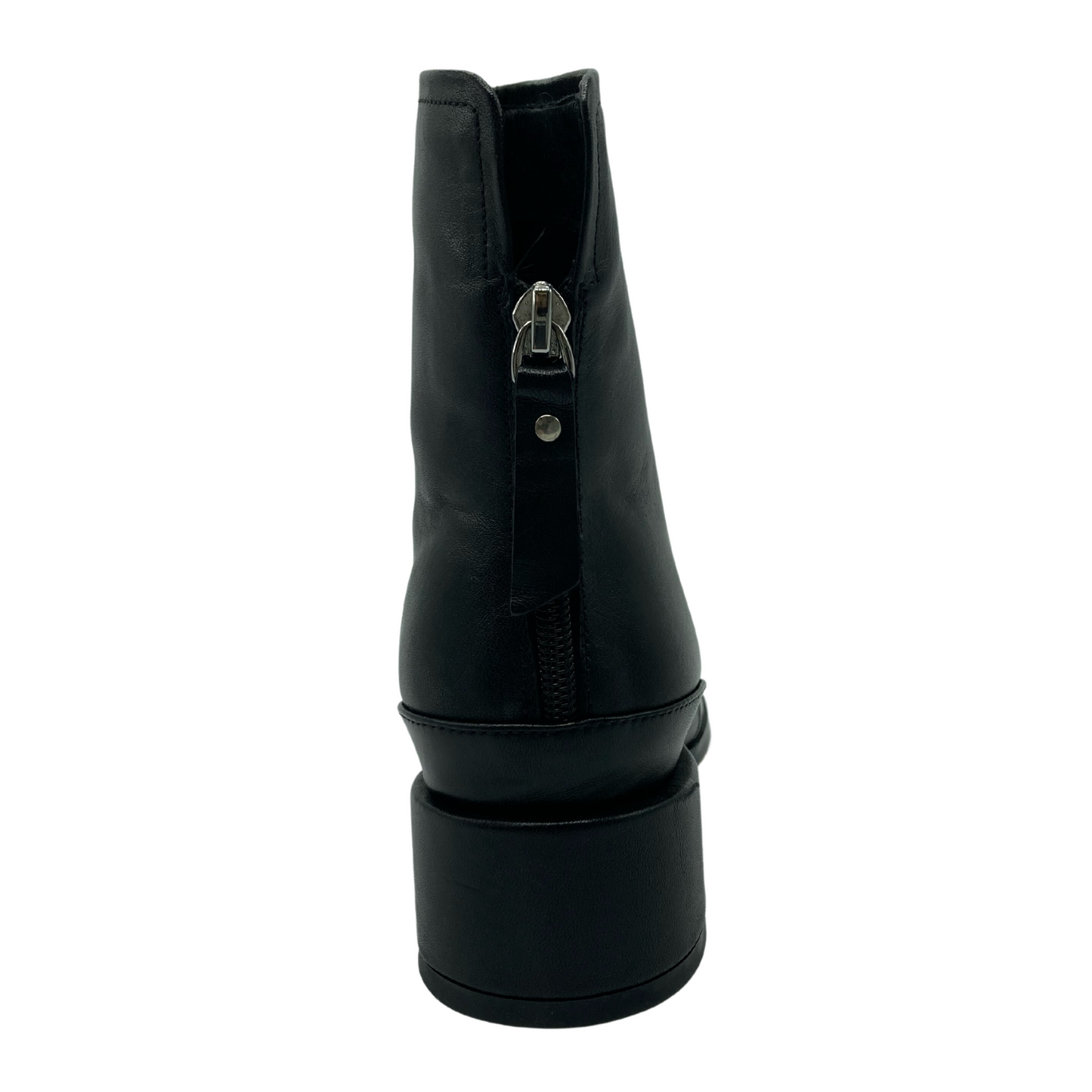 Heel view of short black leather ankle boot with block heel and zipper entry