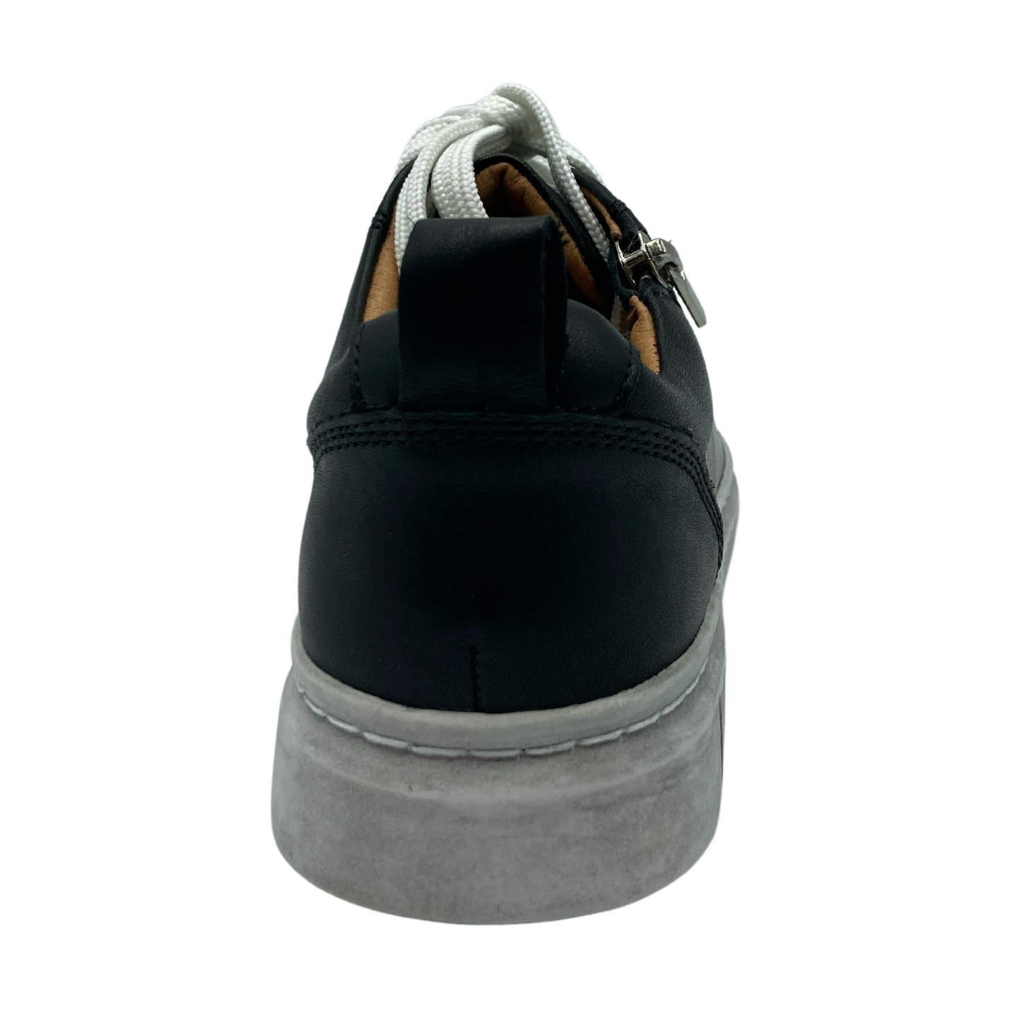 Back view of black leather sneaker with white laces and white rubber outsole