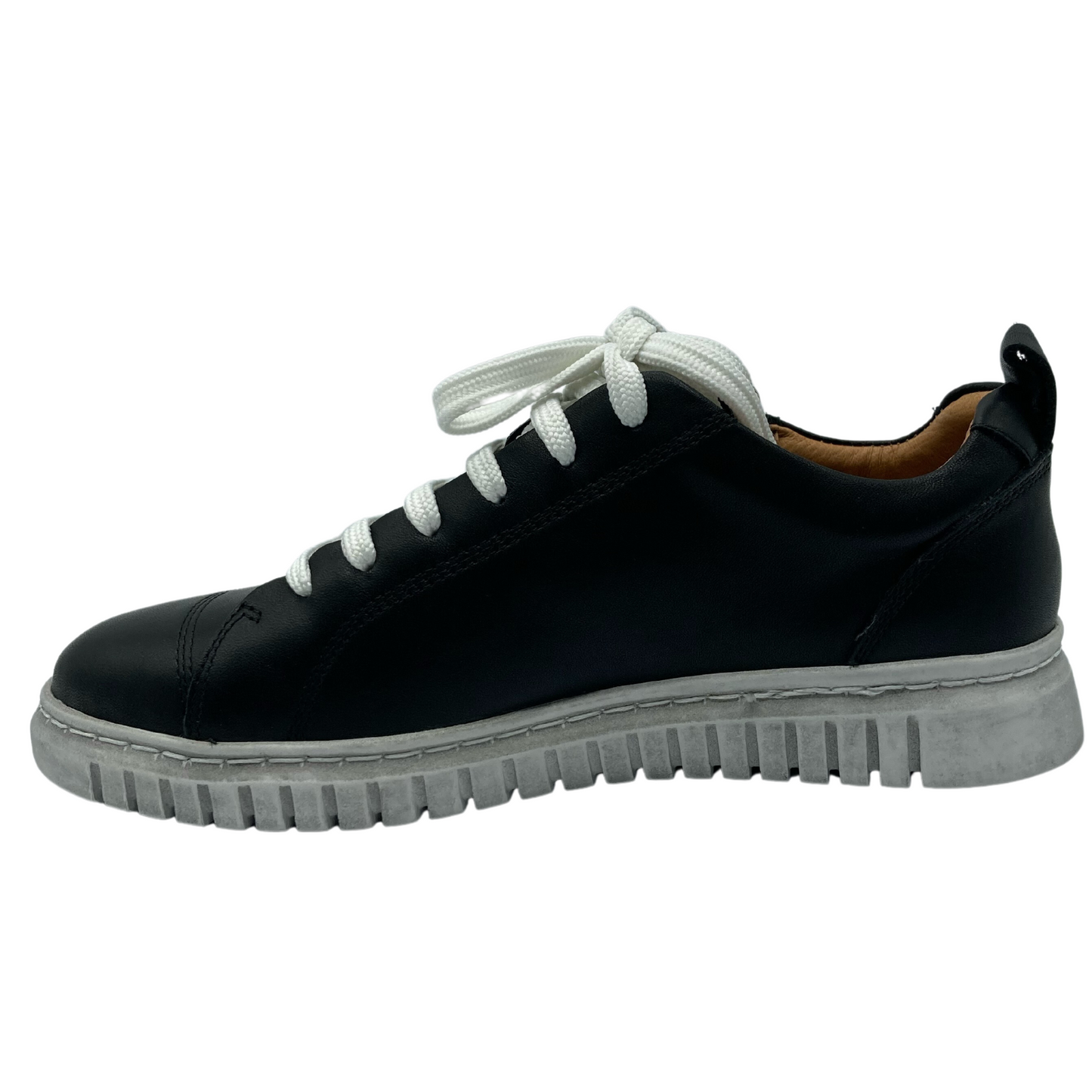 Left facing view of black leather sneaker with white laces and white rubber outsole