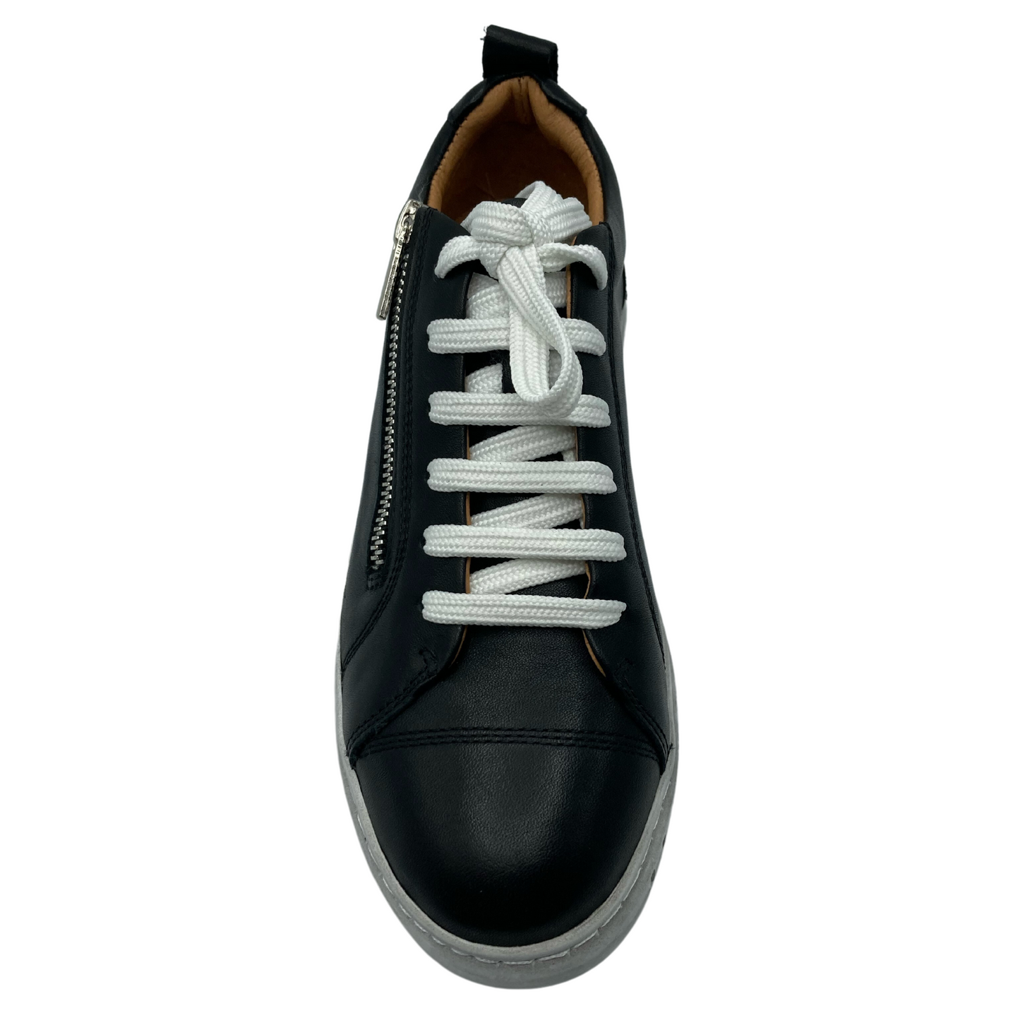 Top view of black leather sneaker with white laces, white rubber outsole and side zipper closure