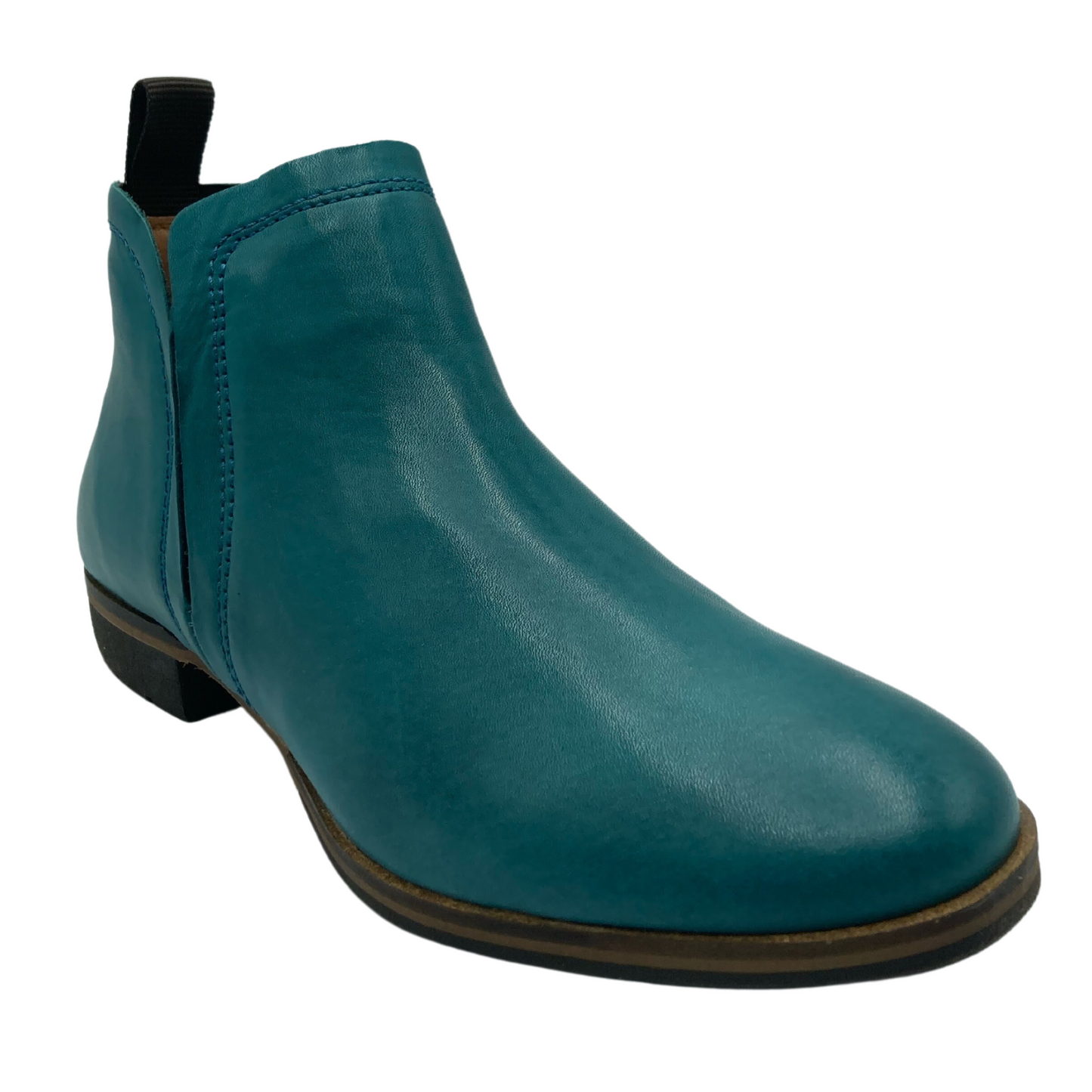 45 degree angled view of blue leather ankle boot with elastic side gussets and pull-on tab on heel
