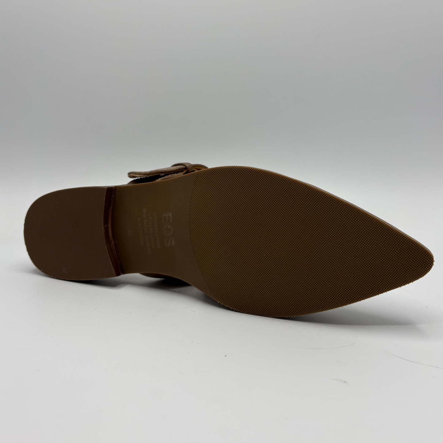 Brown pointed-toe shoe on a white background