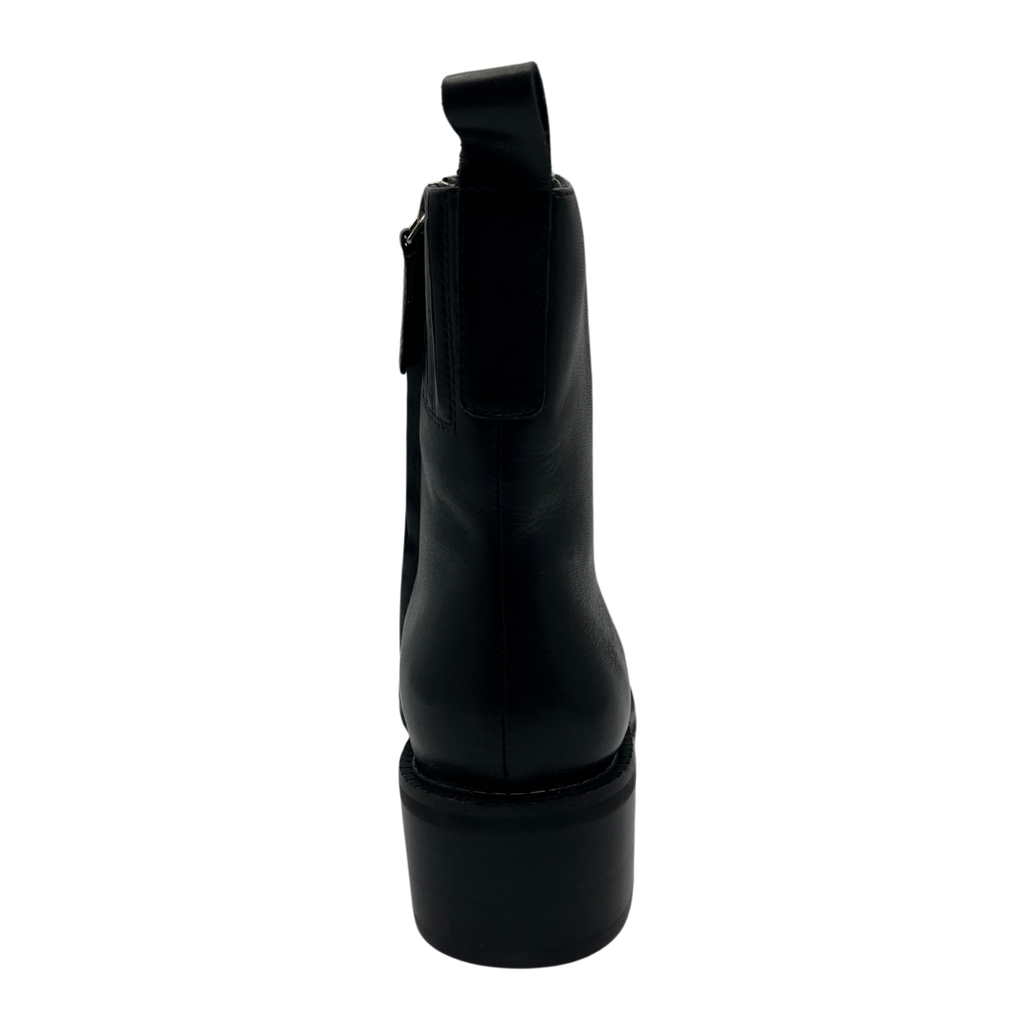 Back view of black leather short ankle boots, short block heel and pull on heel tab