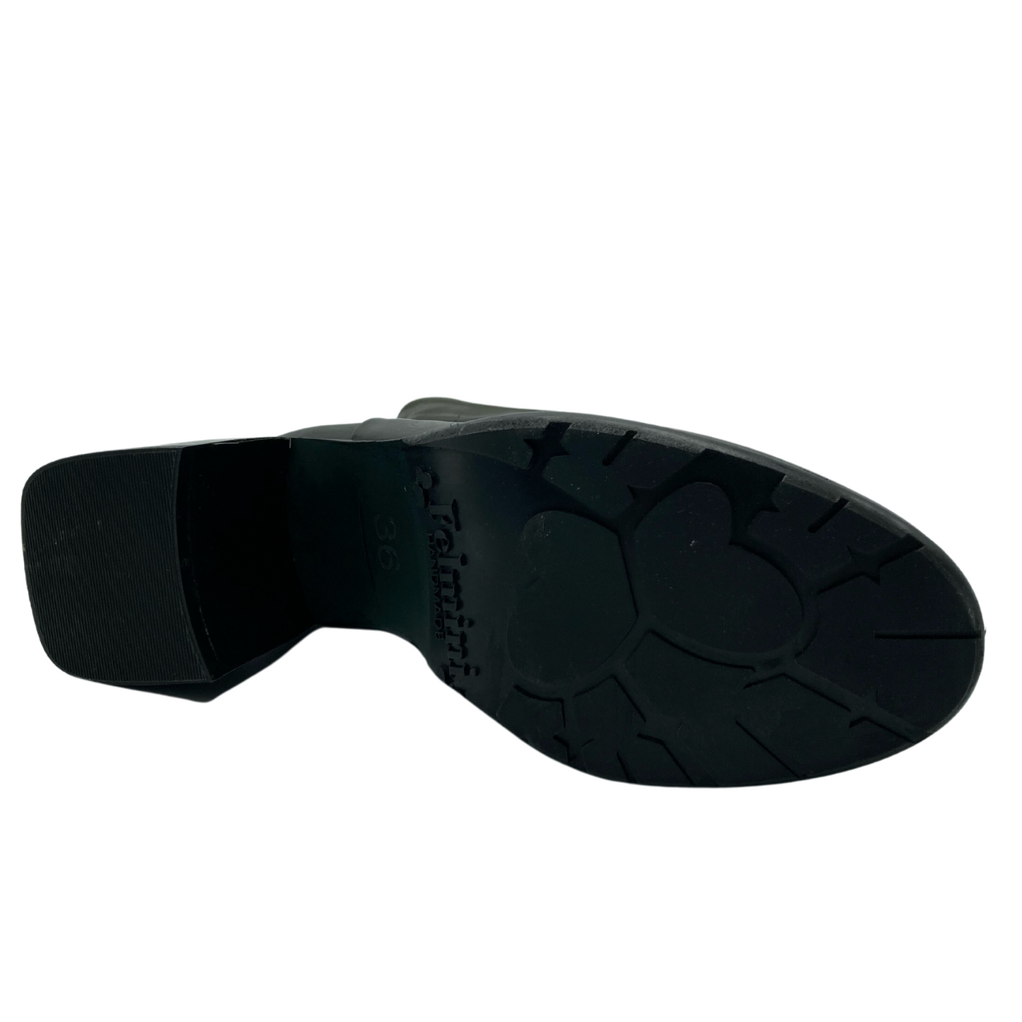 Bottom view of short leather boot with black sole and block heel