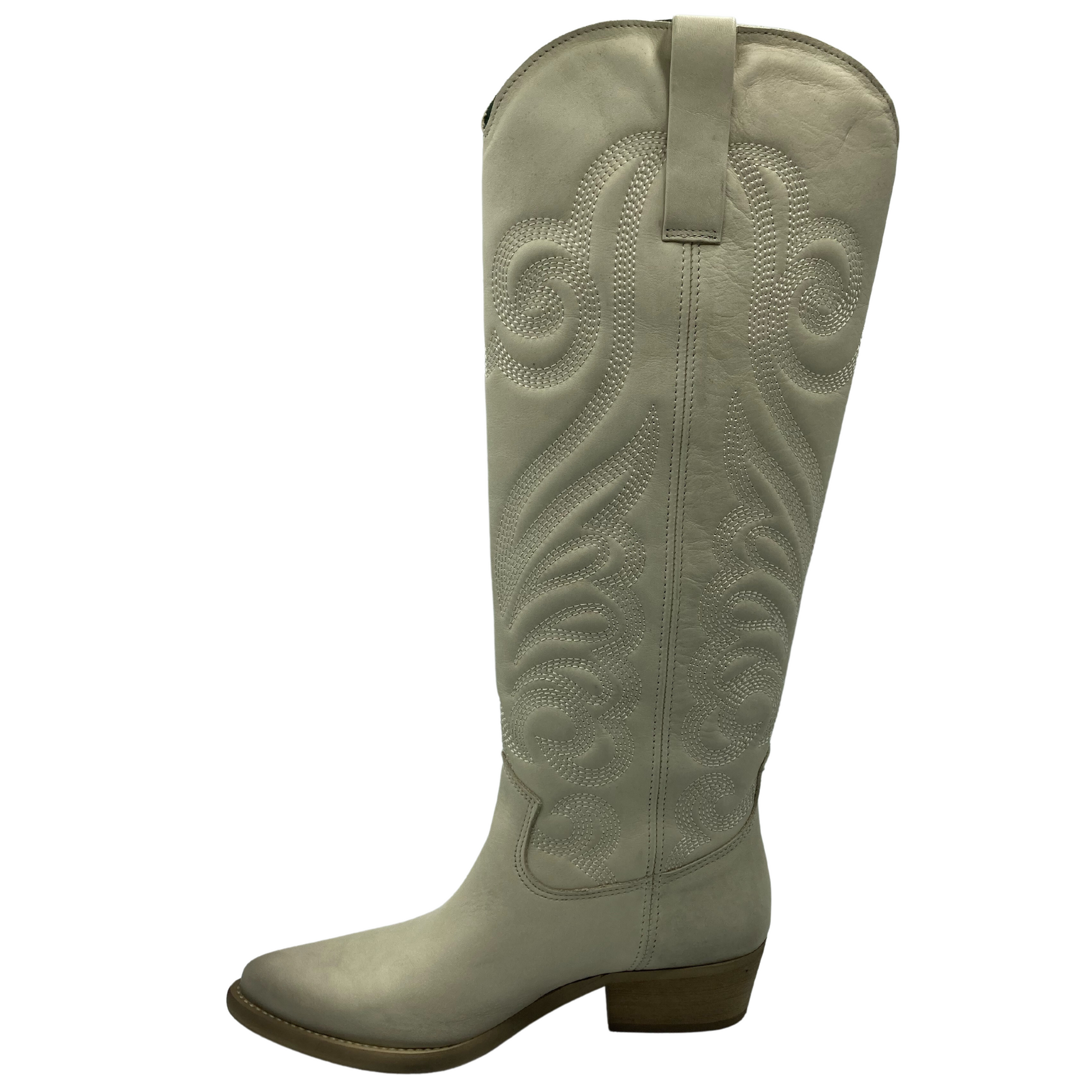 Left facing view of tall, off-white, leather cowboy boot