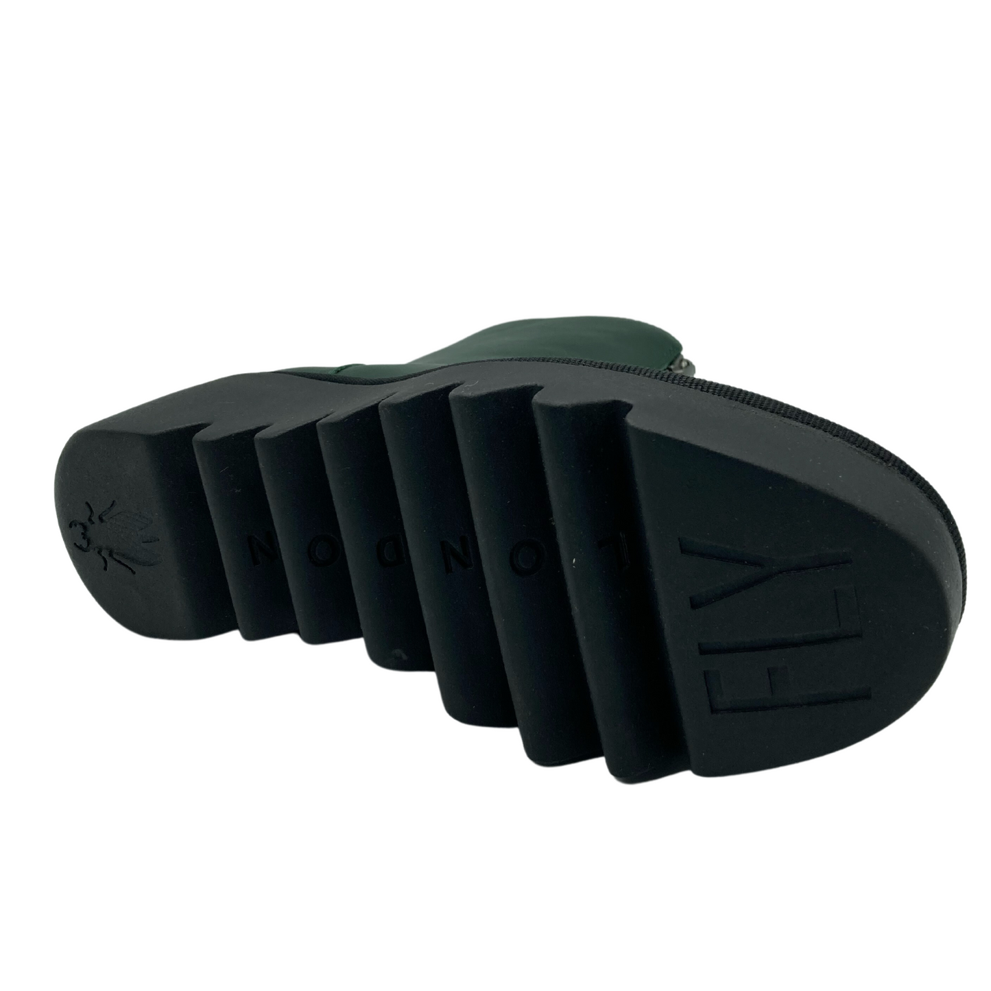 Bottom view of black chunky cleated wedge heel