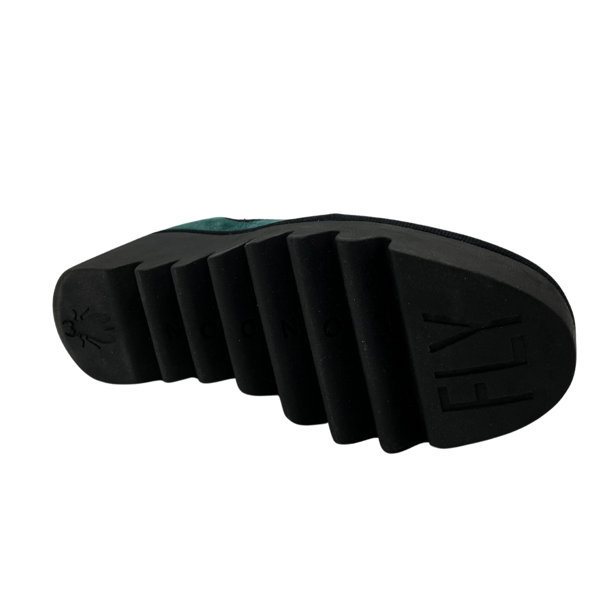 Bottom view of turquoise suede short boot with double elastic side gore and rugged outsole