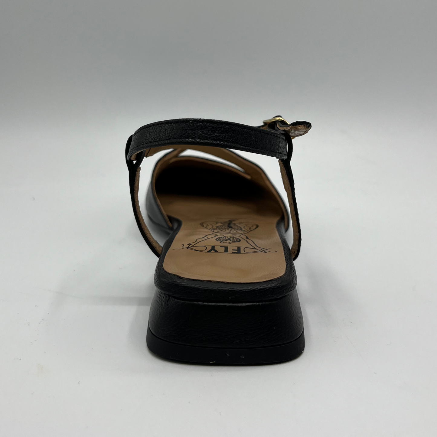 Back view of a black leather sandal with a closed toe, an adjustable ankle strap and a low heel.