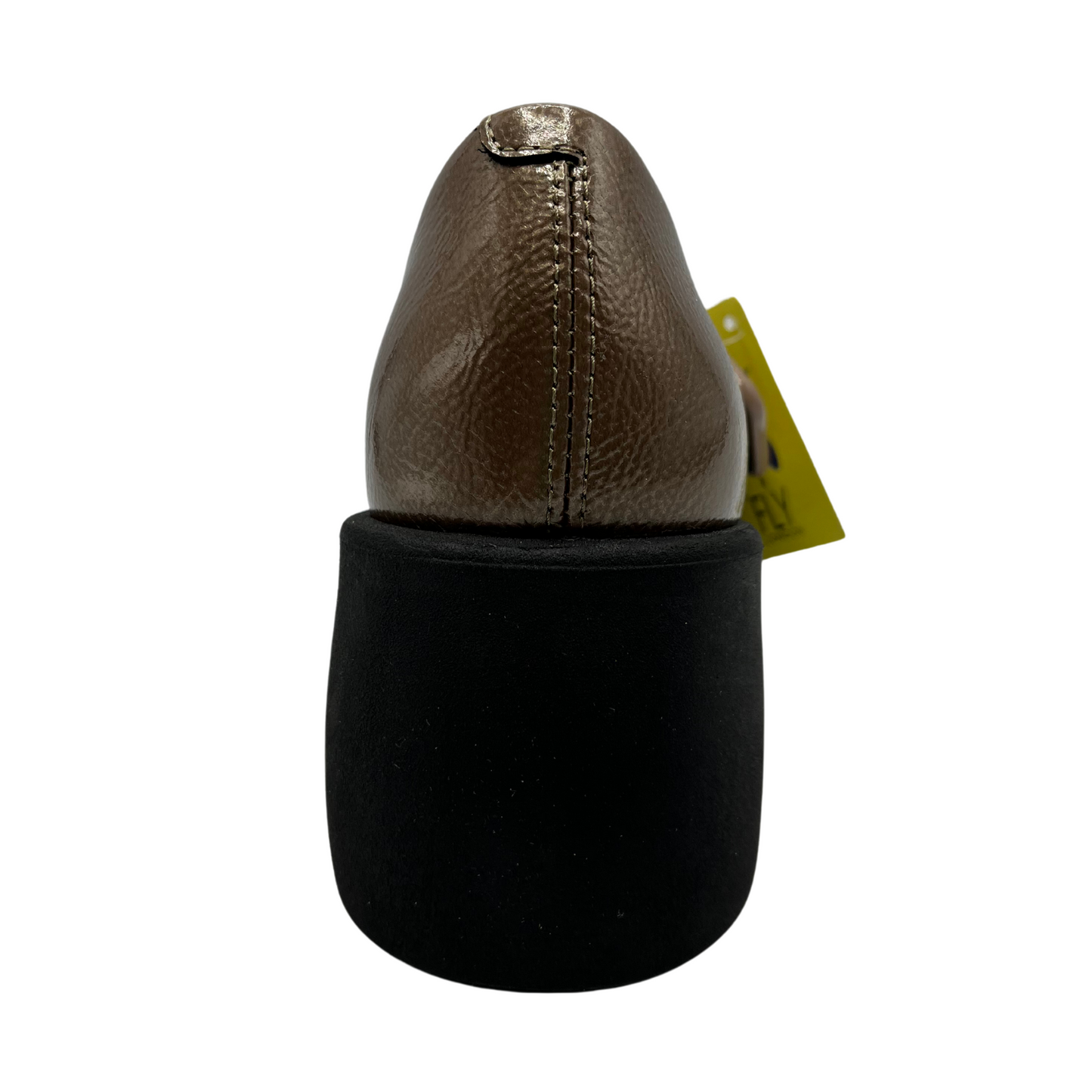 Back view of taupe patent leather maryjane shoe. Matching branded buckle with chunky black heel.