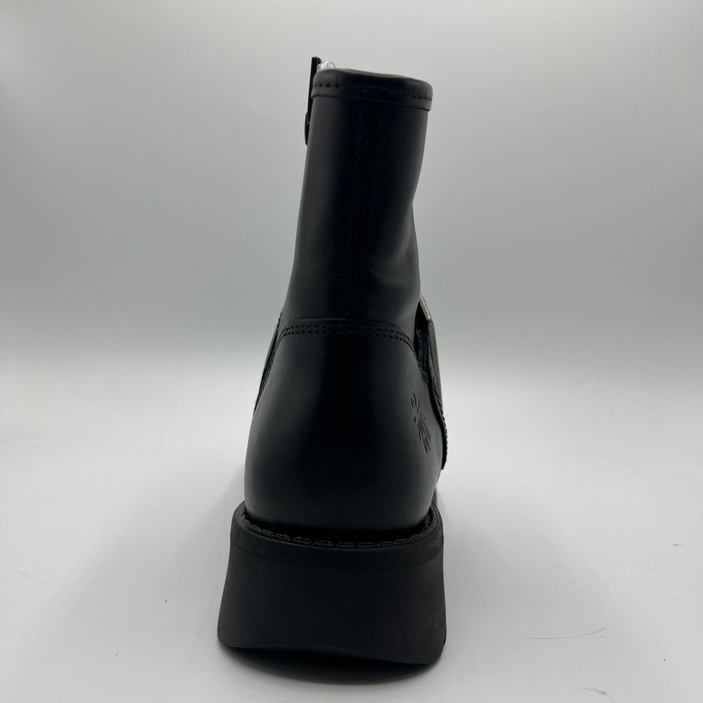 Black ankle boot on a white background