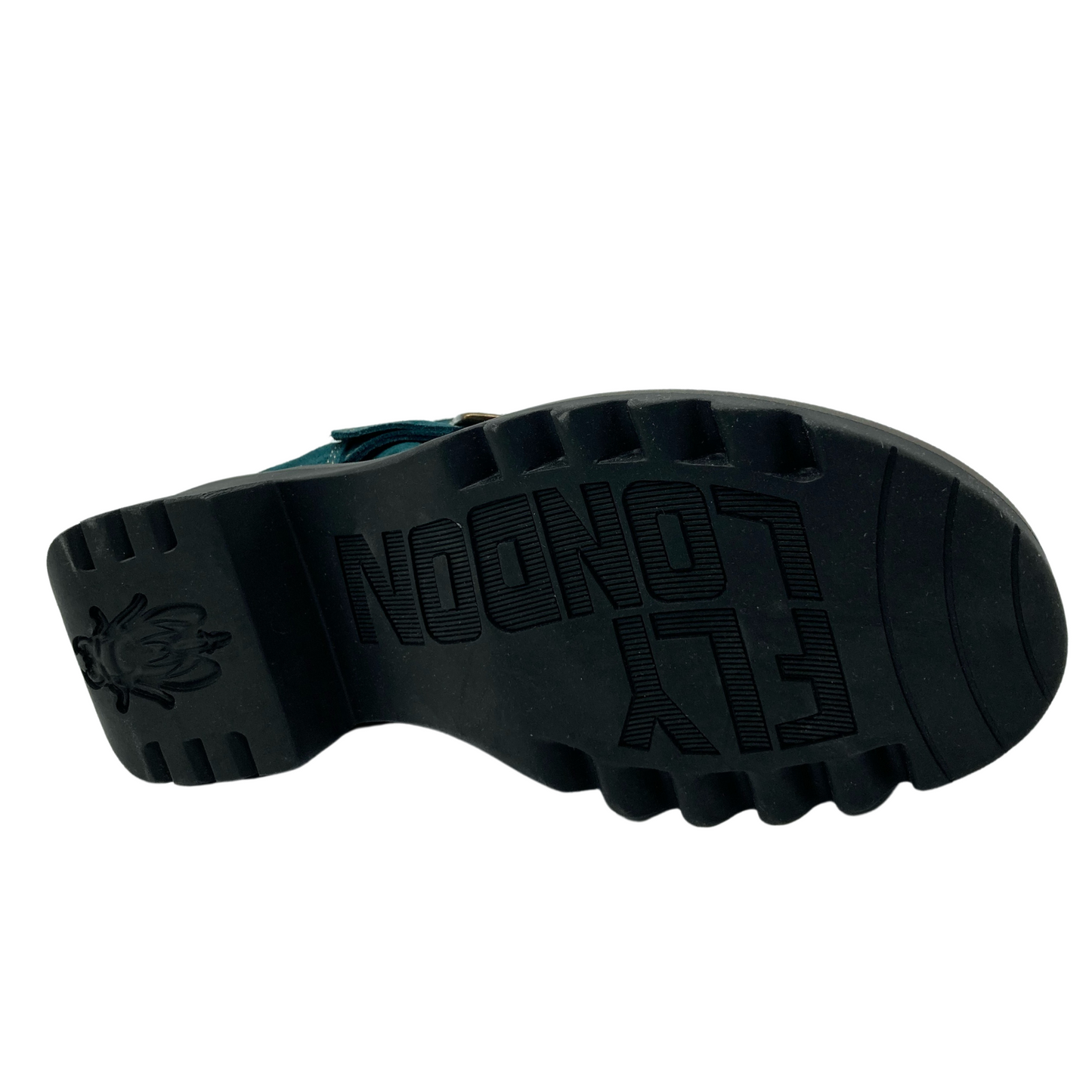 View of the bottom of a suede short boot with black rubber sole