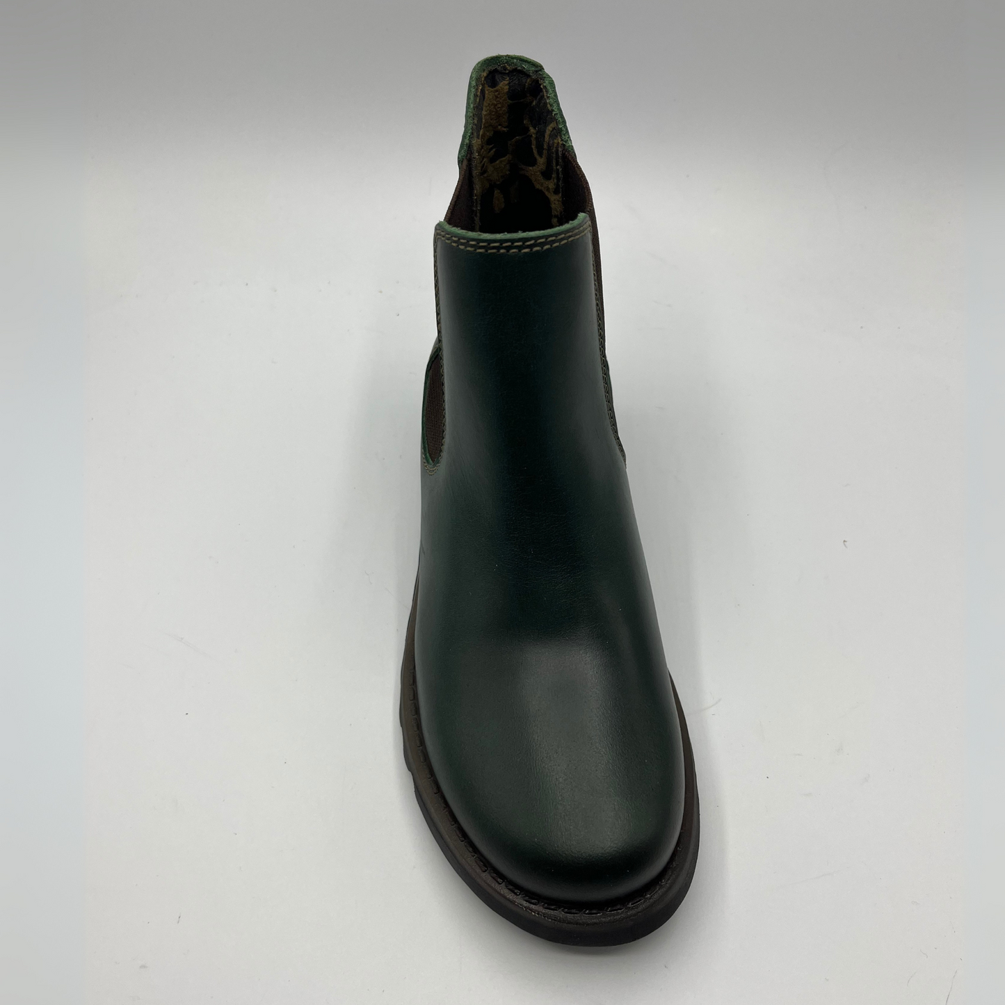 Black rubber boot on a white background