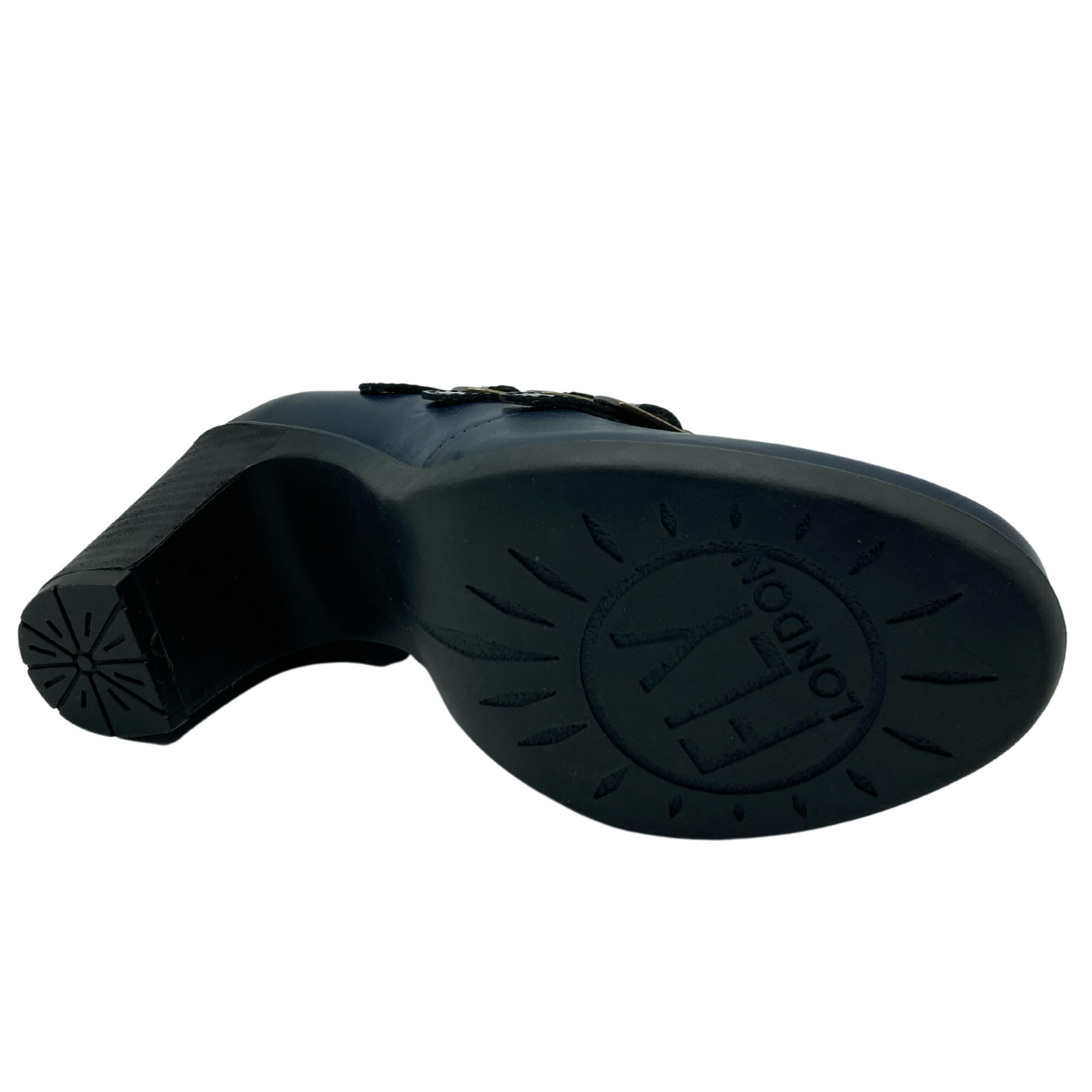 Bottom view of black sole heel with navy leather upper