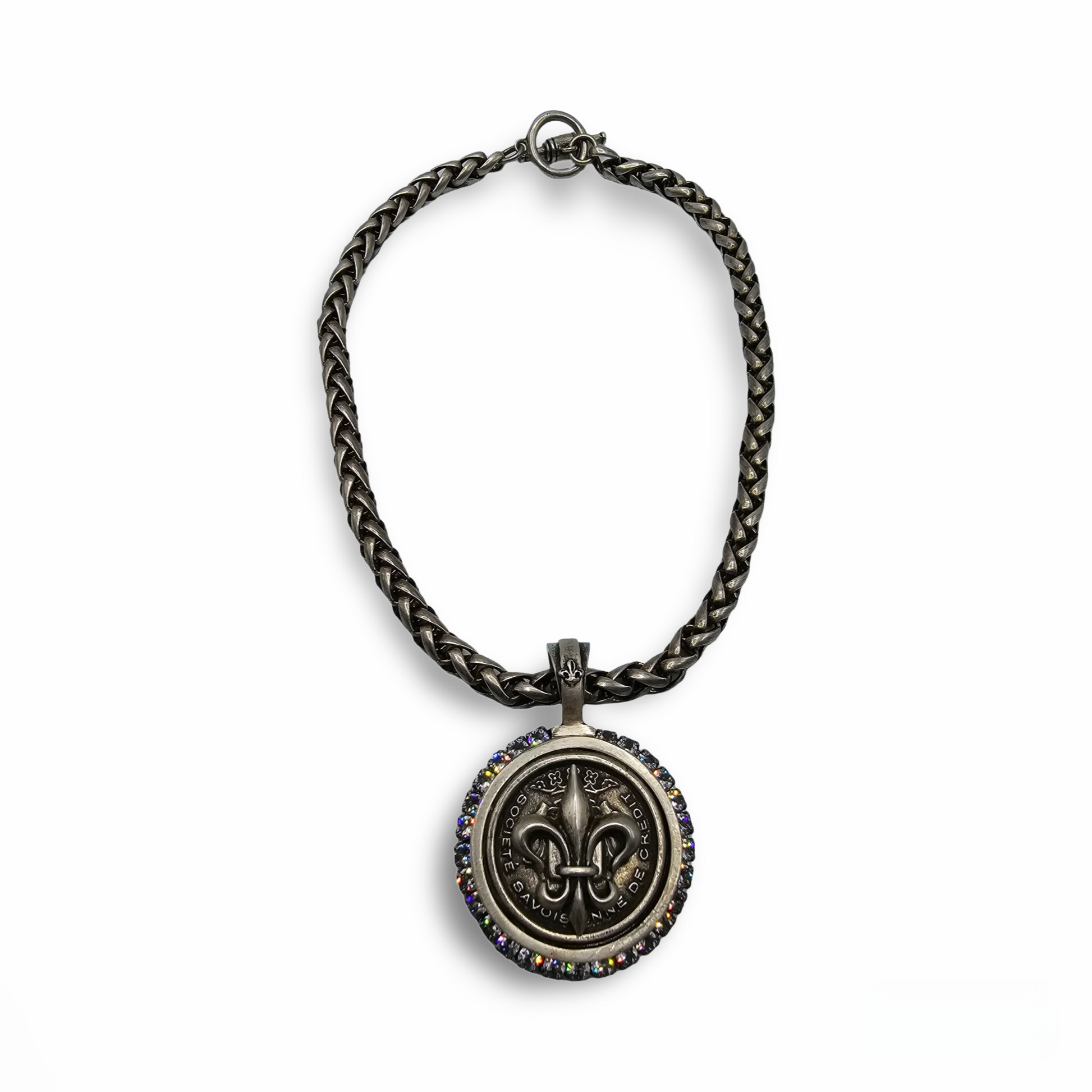 View of a 17" long silver plated necklace with a fleur de lis medallion.
