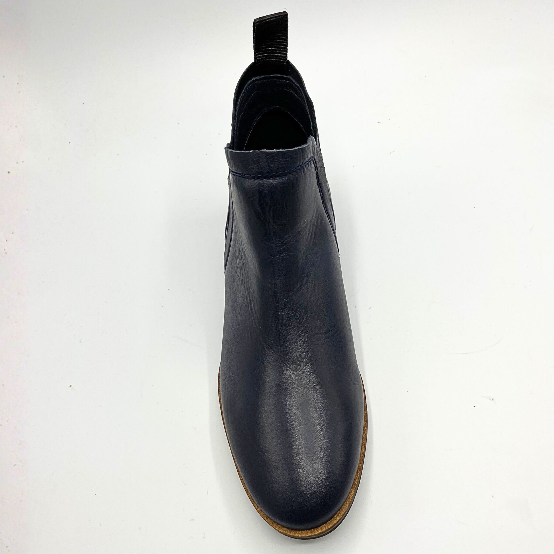 Navy blue boot on a white background