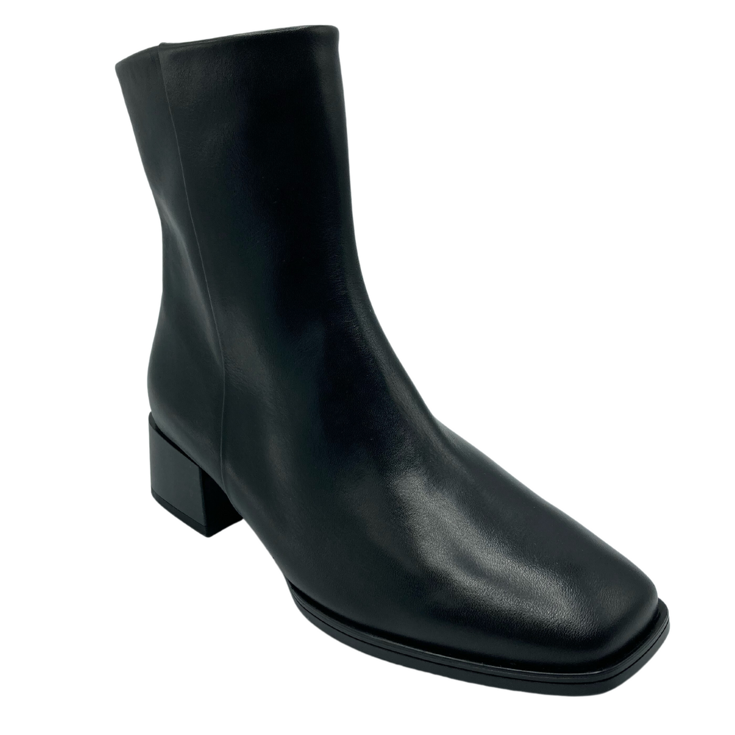 45 degree angled view of black leather short boot with square toe and block heel