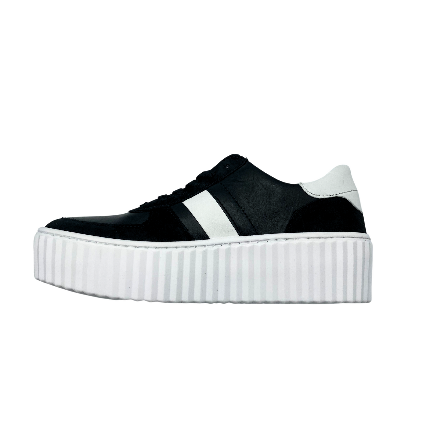 Inside view of a fashion sneaker with a platform sole in white. Body of shoe is black leather with white details.