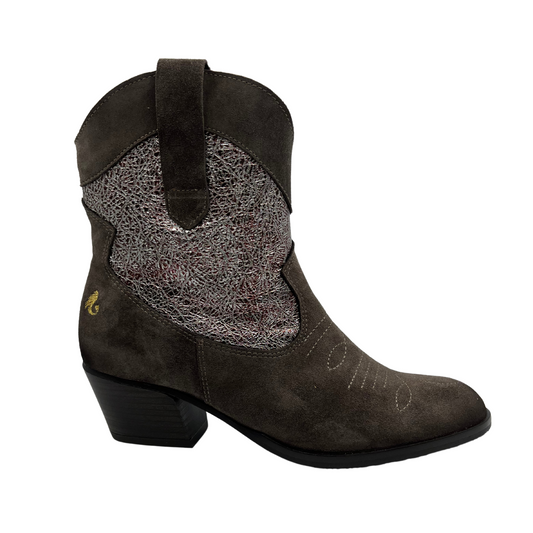 Right facing view of western style leather boot with pointed toe and short block heel.