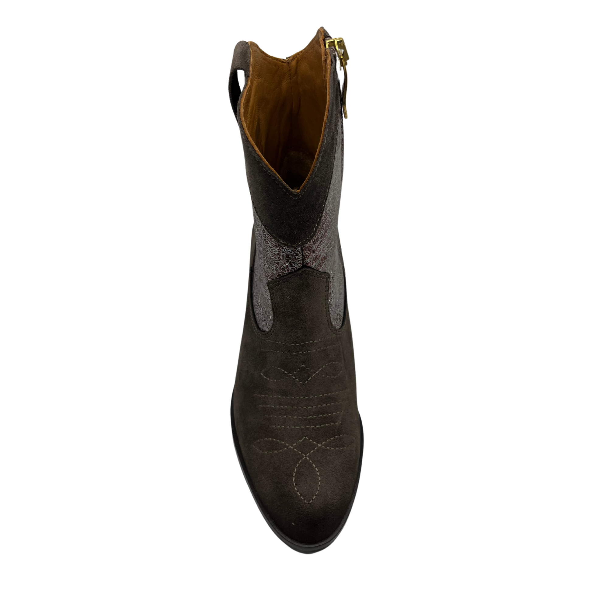 Top view of western style leather boot with pointed toe and short block heel.