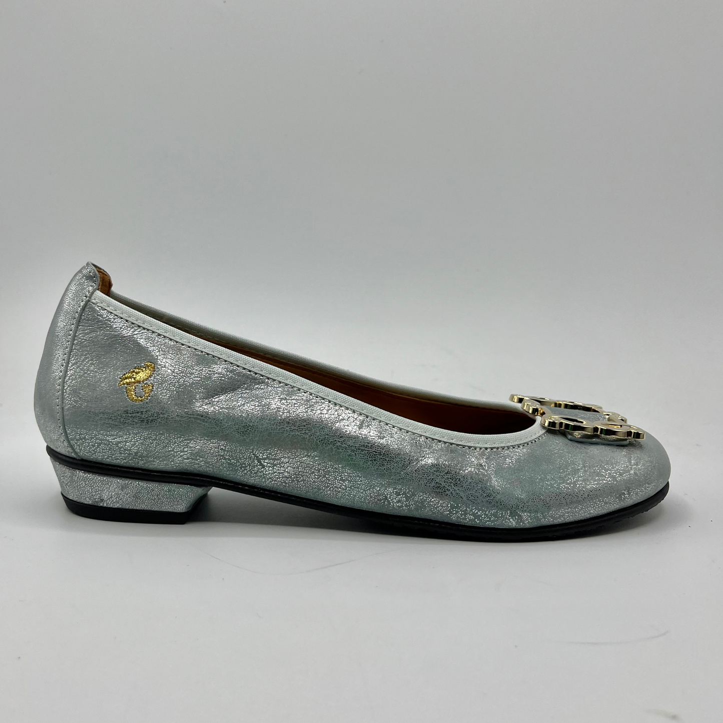 Right facing view of a blue pearl ballet flat with a short wrapped heel, cushioned insole and stretchy upper.