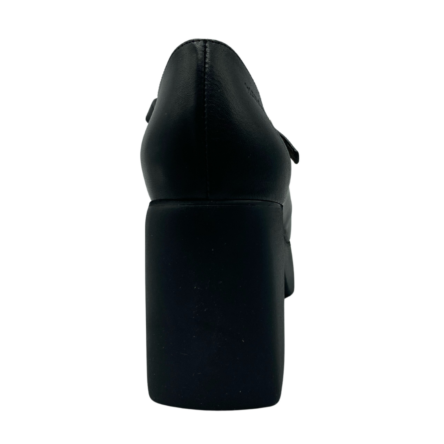 Heel view of black leather upper and black rubber sole of shoe