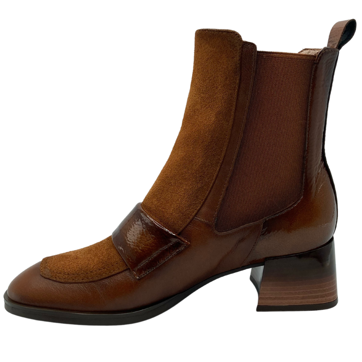 Left facing view of leather and suede short boot with block heel and elastic side gore