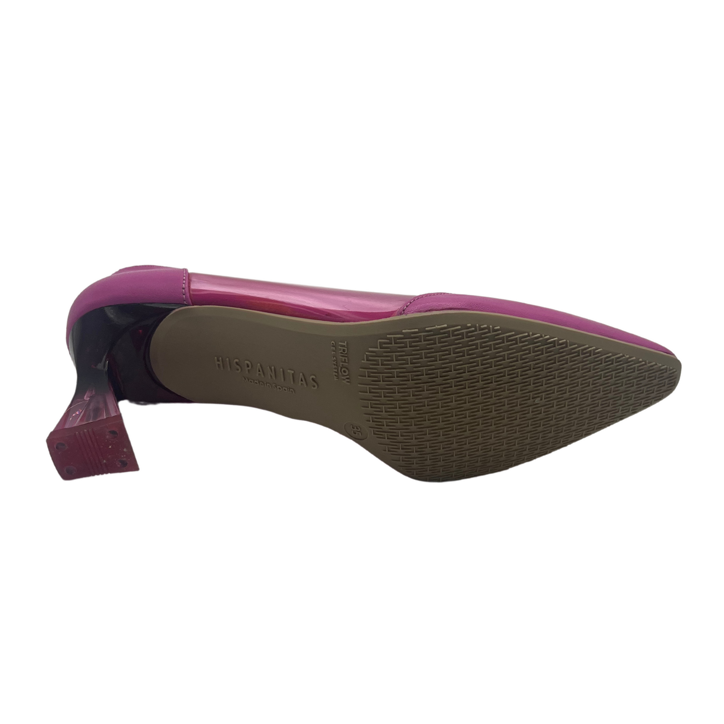Bottom view of pink pointed toe pump with flared lucite heel