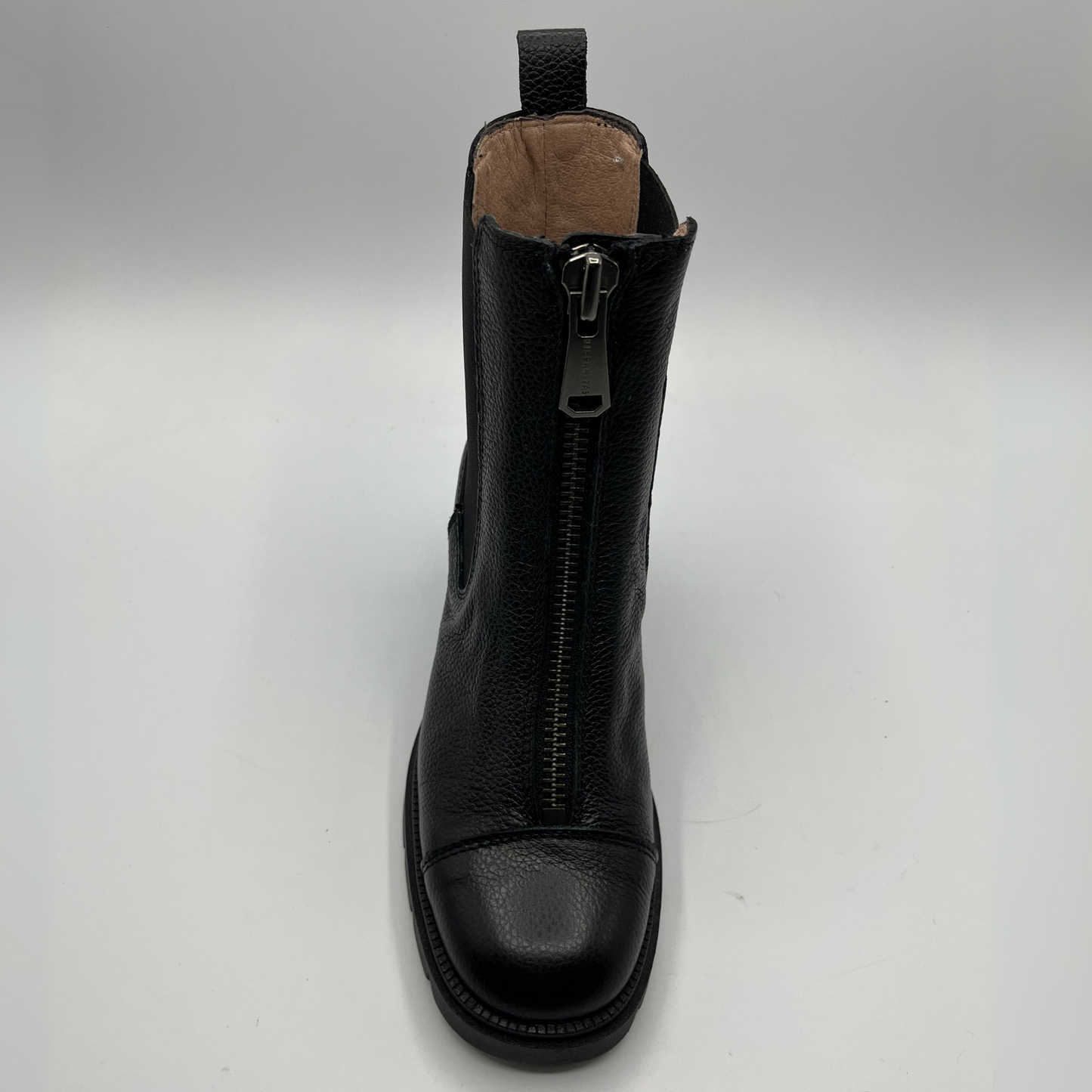 Black leather boot with a zipper on a white background